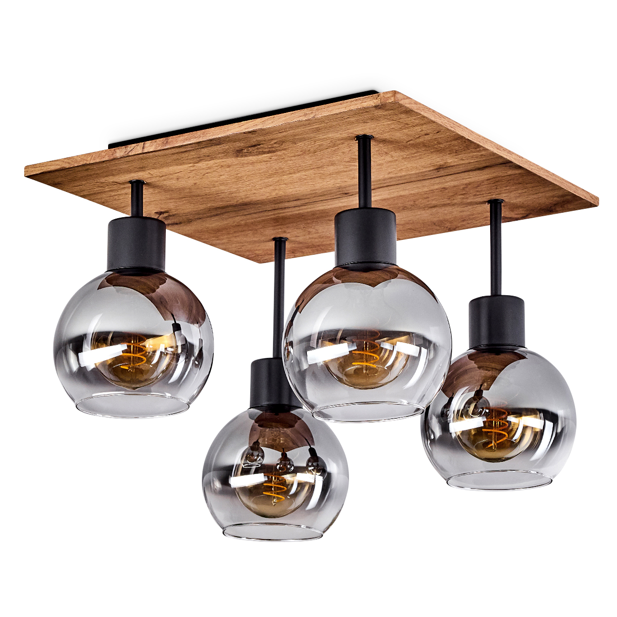 Eine moderne Deckenlampe mit vier Glaskugelschirmen und Holzsockel. Glühbirnen sind in den Kugeln sichtbar. Schwarze Metallhalterungen.