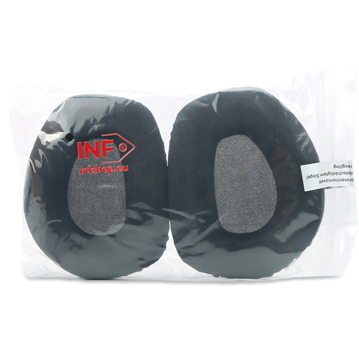 Dwie czarne poduszki do słuchawek w przezroczystej plastikowej torbie. Poduszki mają szare środki, a torba czerwone logo.