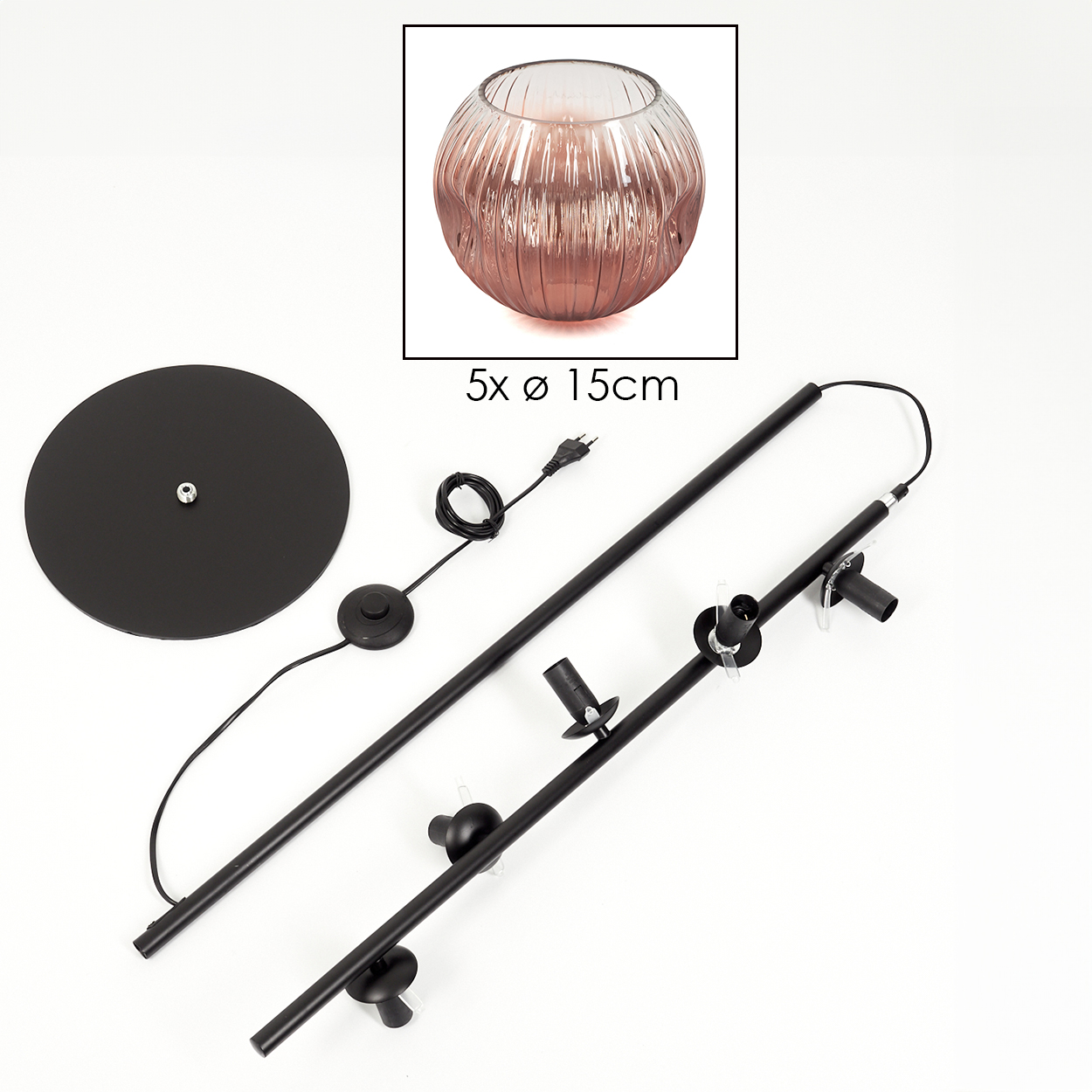 Zerlegte schwarze Stehlampe mit rundem Sockel, Stiel und Leuchten. Eine Glasschale befindet sich oben rechts.