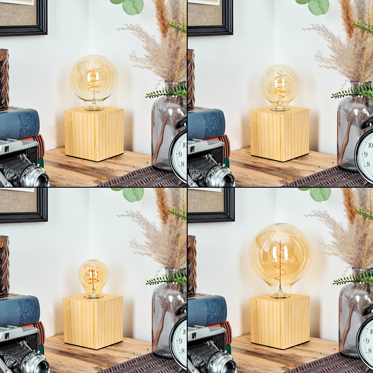 Dekorative Szene mit Holzlampe, Vase mit Trockenblumen, Kamera, Uhr und Büchern auf Holzoberfläche.