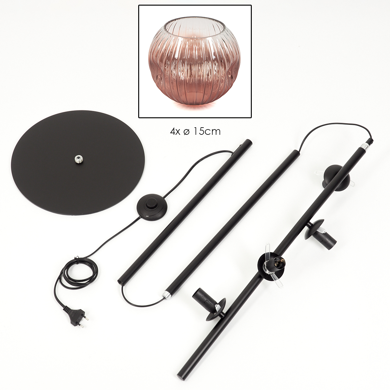 Zerlegte schwarze Stehlampe mit rosafarbenem Glasschirm. Teile umfassen Basis, Stangen, Fassungen und einen Fußschalter.