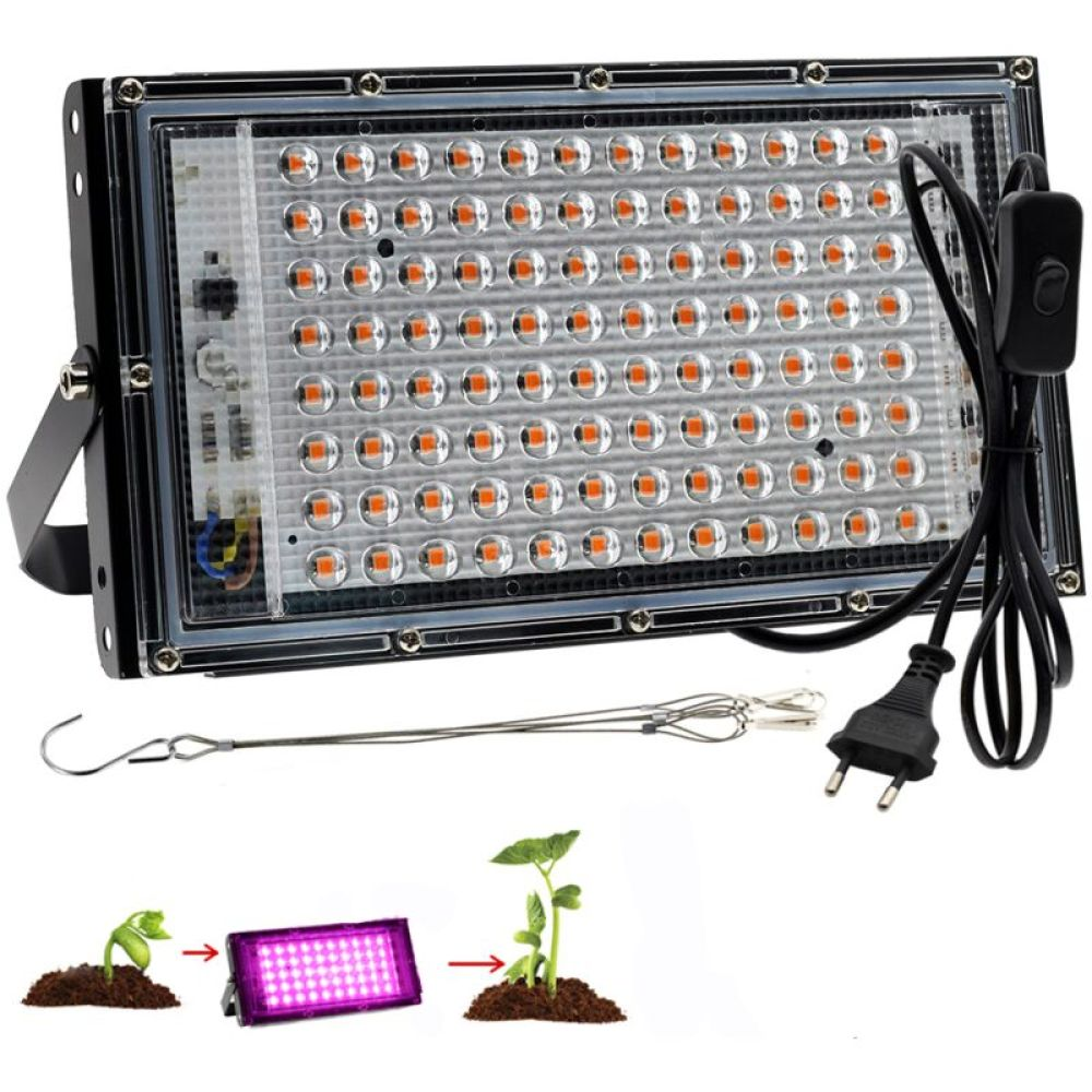 LED-Wachstumslicht mit Netzkabel, Setzlingen und einem violetten Licht. Metallrahmen hält das Licht, mit kleinen Pflanzen.