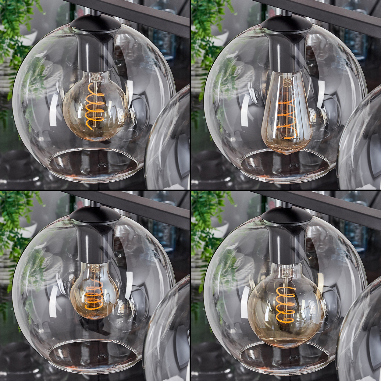 Nahaufnahme einer modernen Deckenleuchte mit vier Glaskugelschirmen, jede mit einer anderen Art von Edison-Glühbirne.