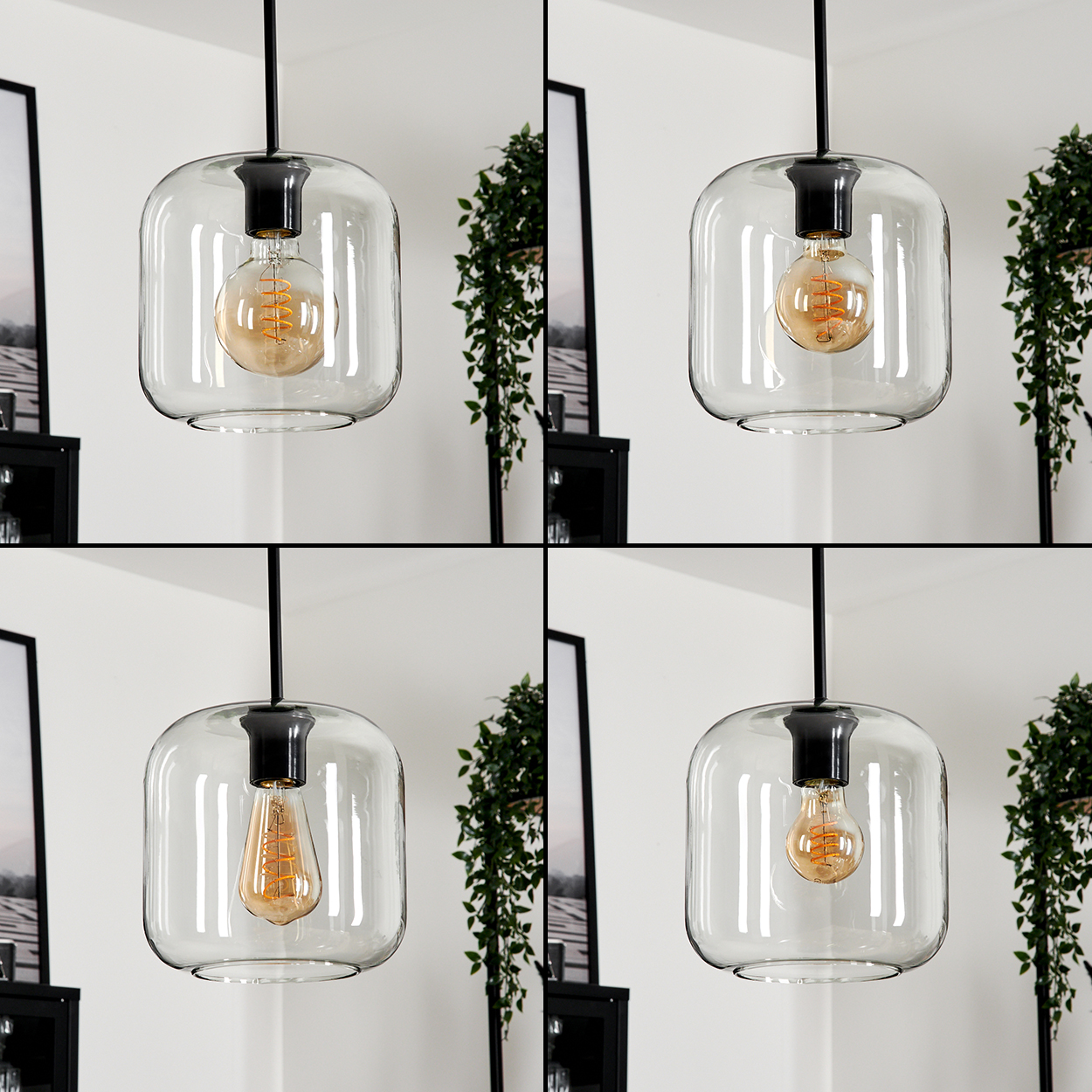 Vier Glas-Pendelleuchten mit warmen Glühbirnen hängen von der Decke. Grüne Pflanzen und schwarz gerahmte Kunst im Hintergrund.