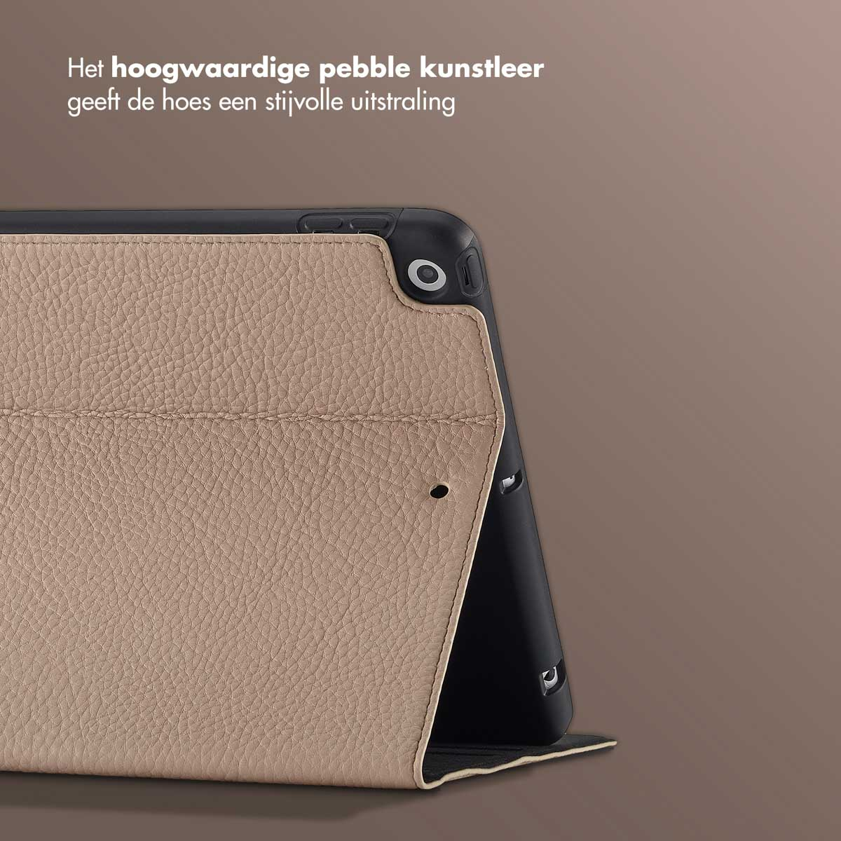 Close-up of a tablet case. The case is tan, textured leather with a black border. The background is a gradient brown.