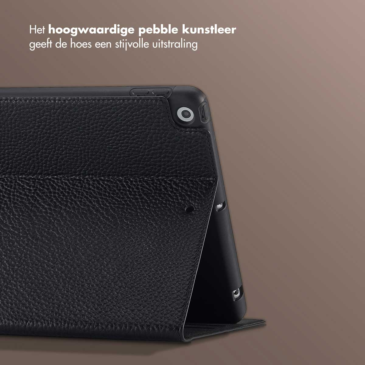 A black tablet case made of pebble leather. The case is open and angled, showing the tablet. Text in Dutch is at the top.