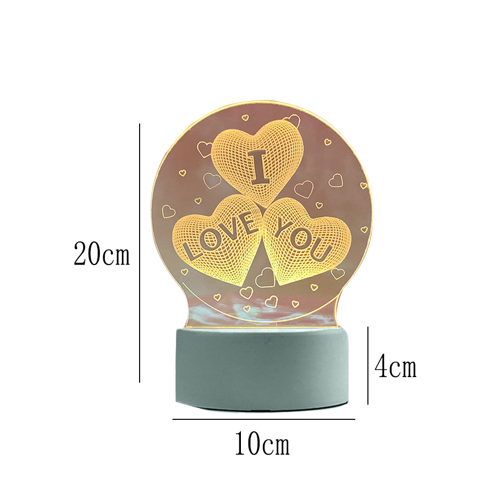 Eine dekorative Lampe mit "I LOVE YOU" auf drei beleuchteten Herzen. Der Sockel ist grau und die Maße sind beschriftet.