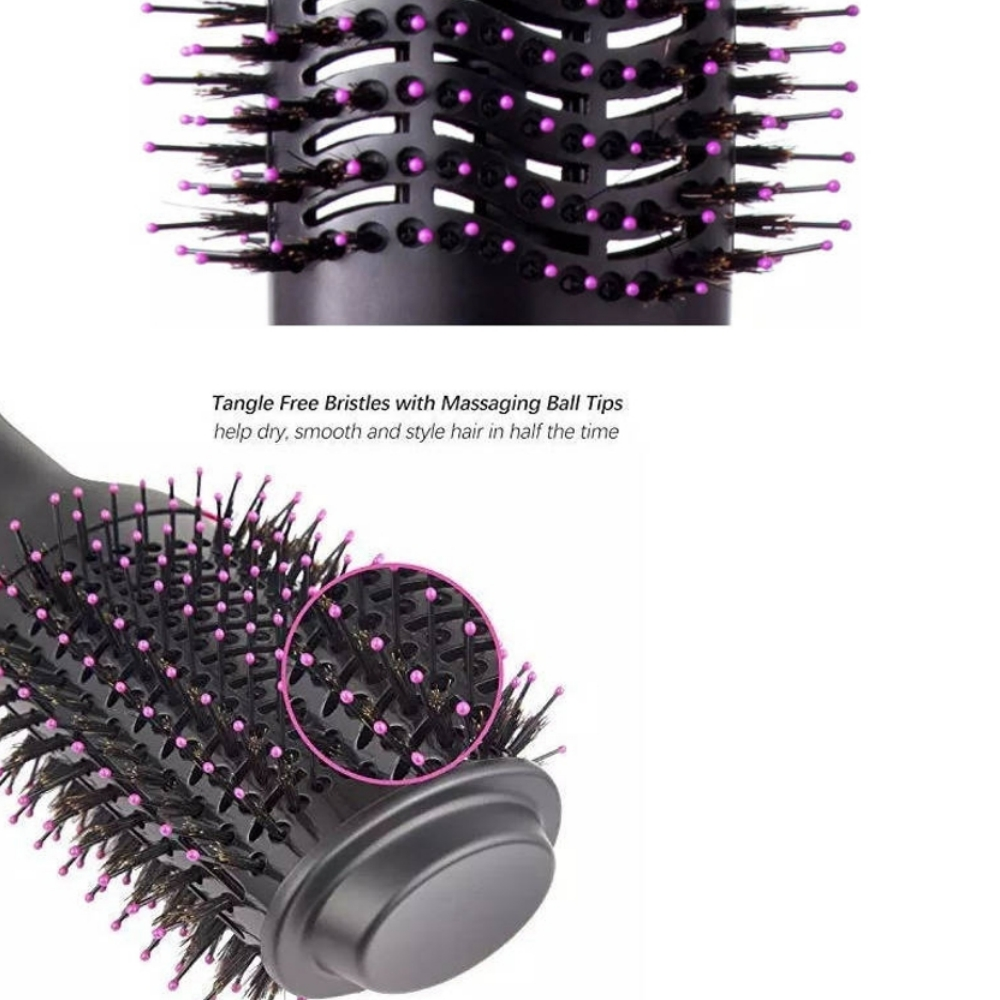 Nahaufnahme einer schwarzen Haarbürste mit rosa Spitzen. Ein kreisförmiger Einsatz zeigt Details der Borsten und Spitzen.