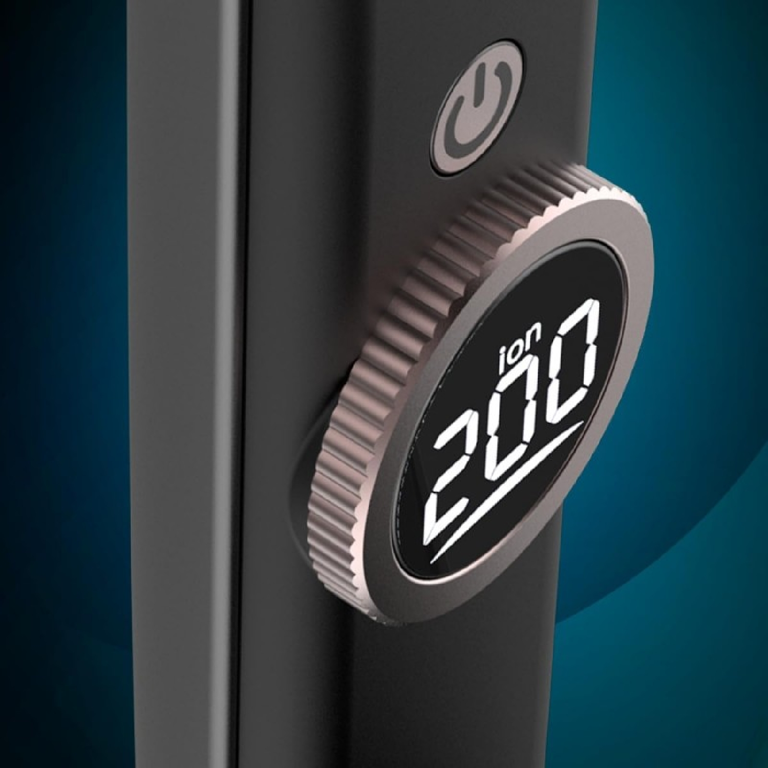 Close-up of a black device with a silver dial showing 'ion 200'. A power button is visible above the dial.