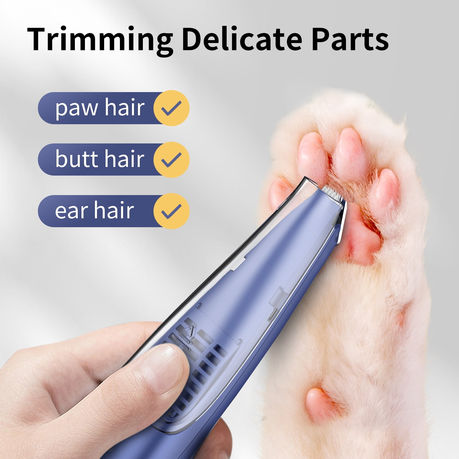Eine Hand hält einen blauen Haartrimmer für Haustiere in der Nähe einer Katzenpfote. Text sagt: Pfoten-, Gesäß- und Ohrhaare.