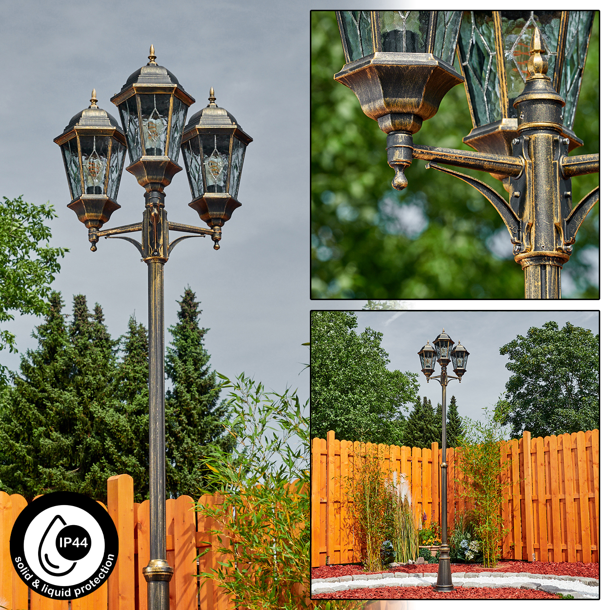 Eine dekorative, bronzefarbene Laterne mit drei Lampen steht in einem Garten. Im Hintergrund sind Holzzaun, Pflanzen und Bäume zu sehen.