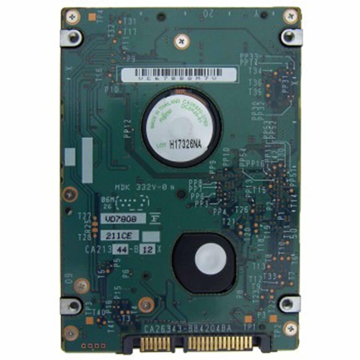 Un circuito stampato verde con vari componenti, tra cui chip, connettori ed etichette. Ci sono due elementi circolari sulla scheda.