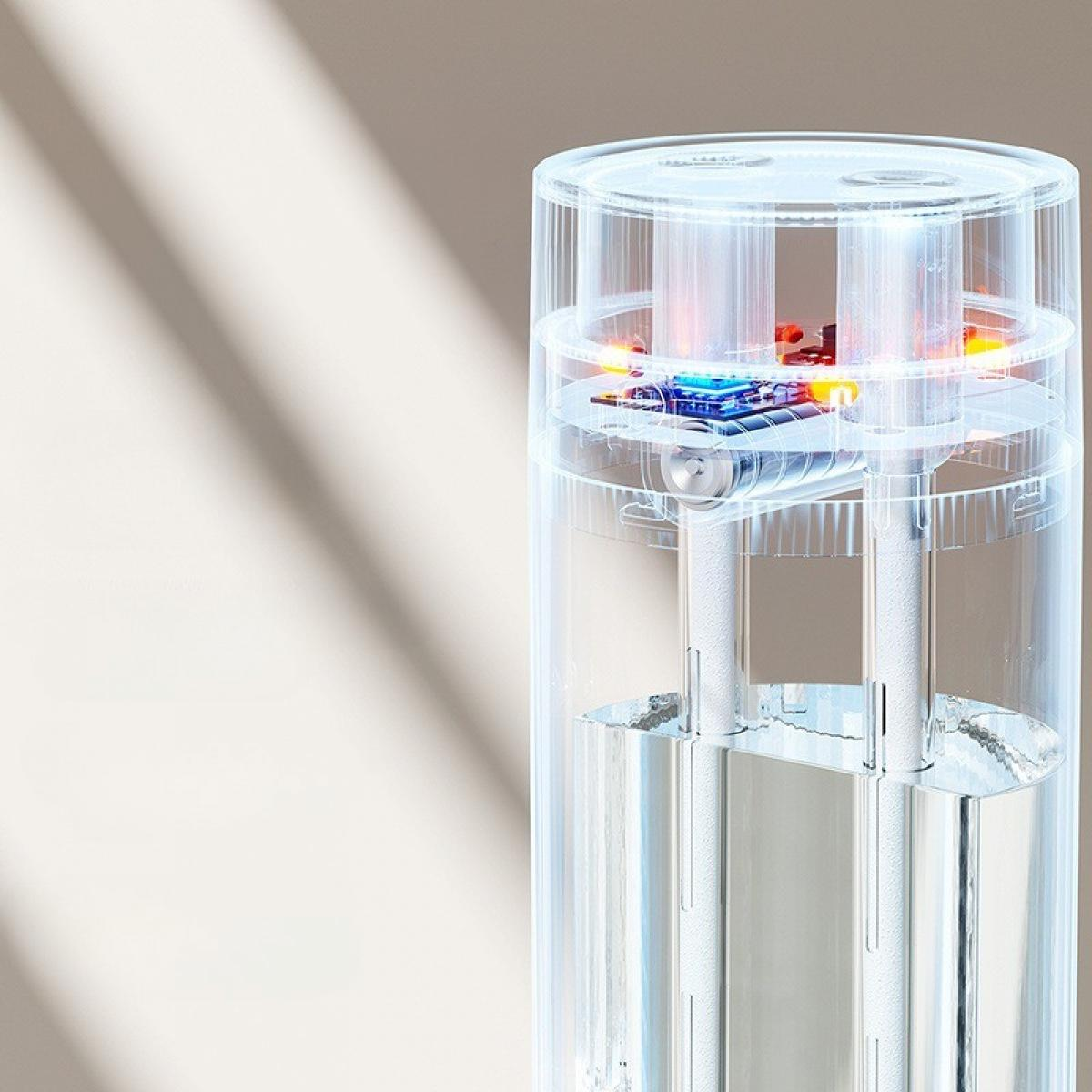 Transparentes Gerät mit internen Komponenten. Es ist zylindrisch und zeigt Flüssigkeit und innere Mechanismen. Licht und Schatten im Hintergrund.