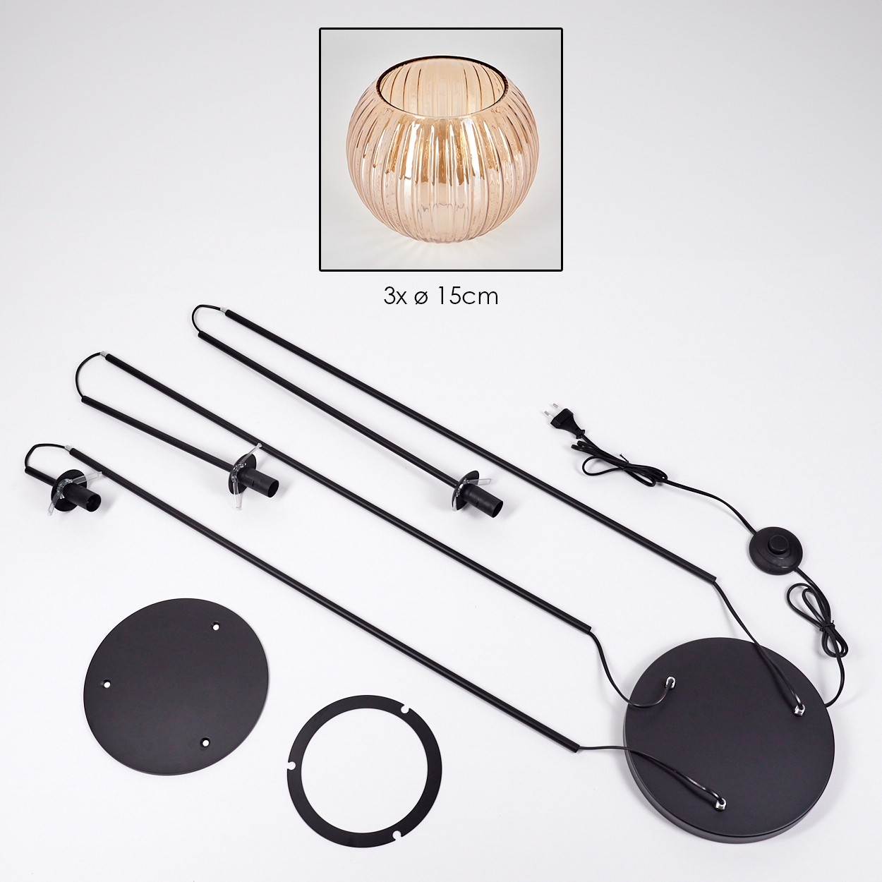 Zerlegte Lampenteile: Glasschirm, schwarze Metallstäbe, Sockel und elektrische Komponenten. Durchmesser des Lampenschirms 15 cm.