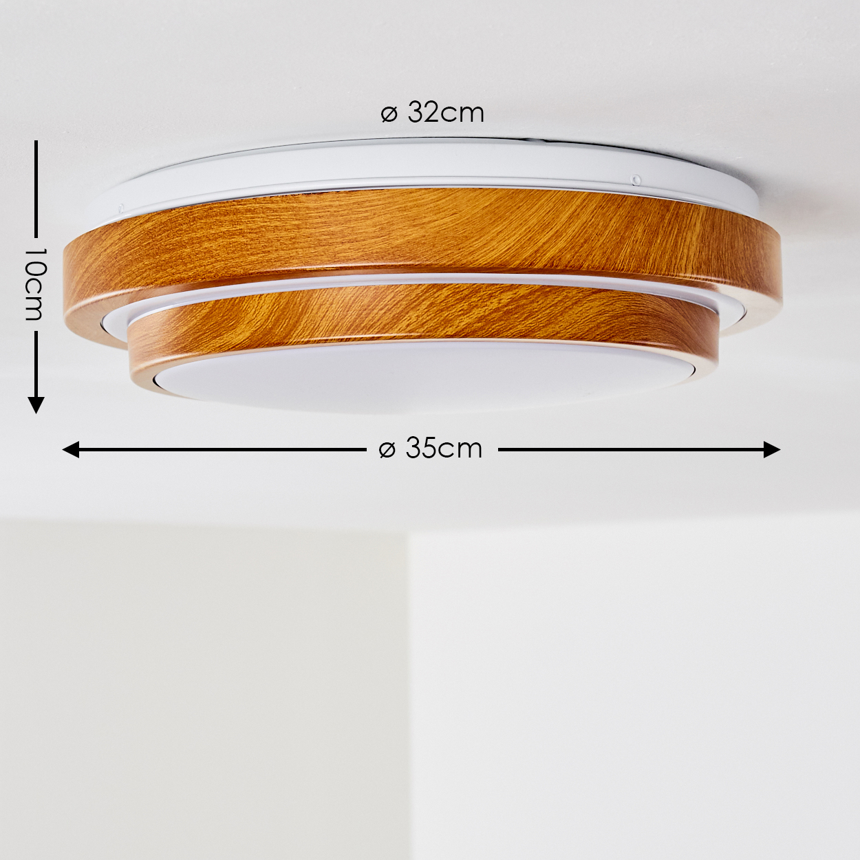 Eine Deckenleuchte mit Holzoptik und weißen Akzenten. Die Abmessungen sind angegeben: 32 cm, 35 cm und 10 cm.