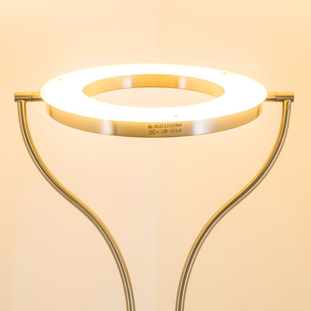 Eine moderne Ringlichtlampe mit kreisförmiger Lichtquelle, getragen von gebogenen Metallarmen. Der Hintergrund ist ein weicher gelber Farbverlauf.