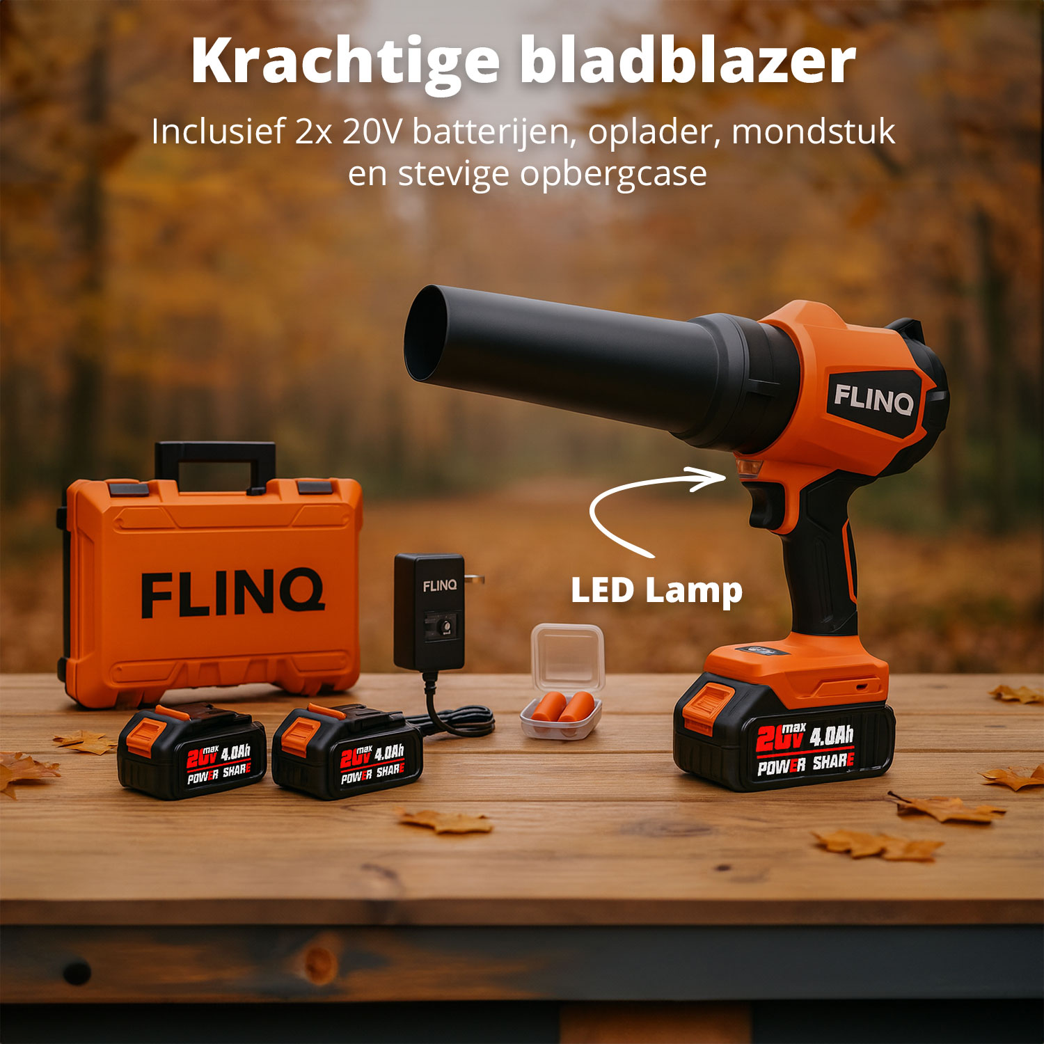An orange leaf blower with black nozzle, batteries, charger, and case on a wooden table. Text reads 'FLINQ' and 'LED Lamp'.