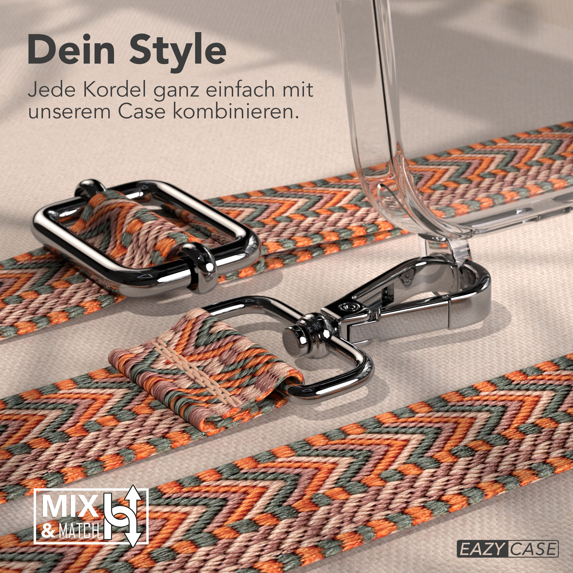 Nahaufnahme eines Handyhüllenriemens mit einem Muster in Orange, Grün und Beige mit Metallverschlüssen.