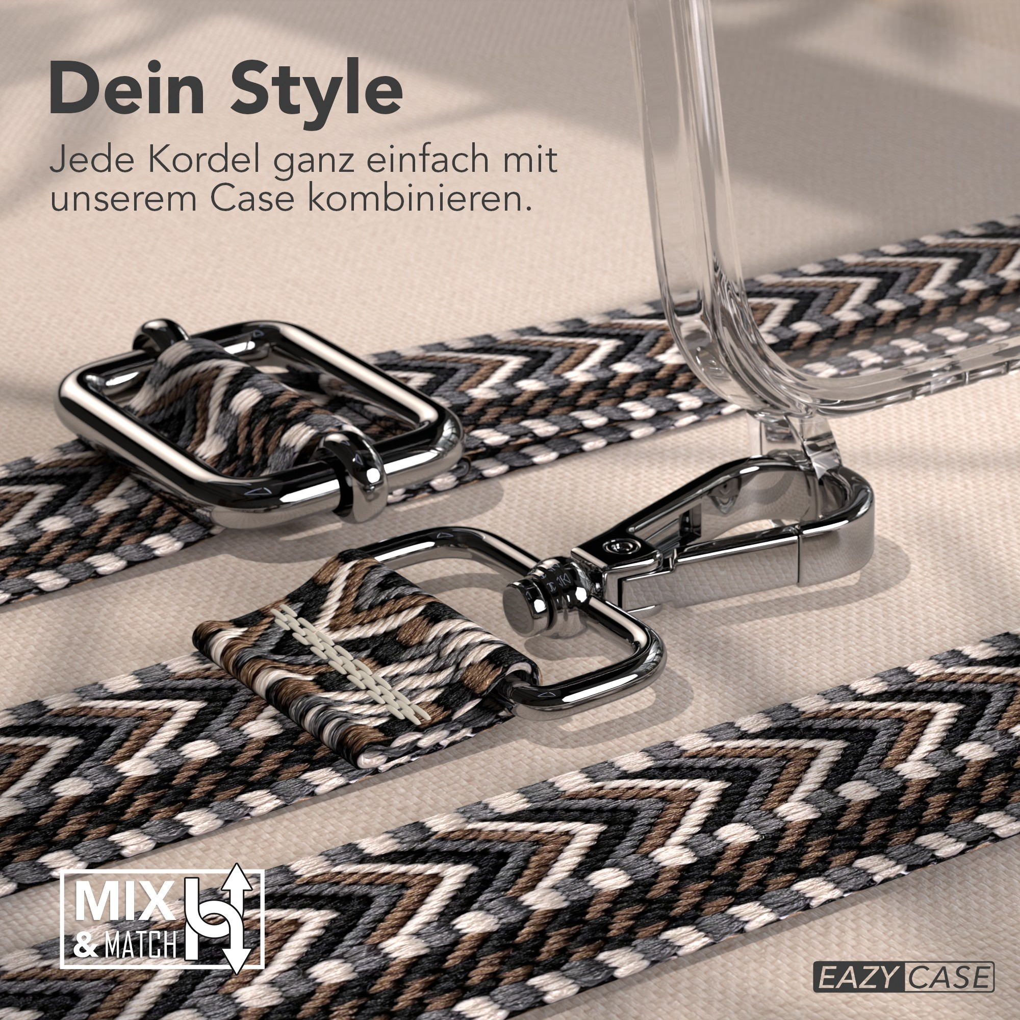 Nahaufnahme eines Handyhüllenriemens mit Metallverschluss. Der Riemen hat ein braunes, weißes und schwarzes geometrisches Muster.