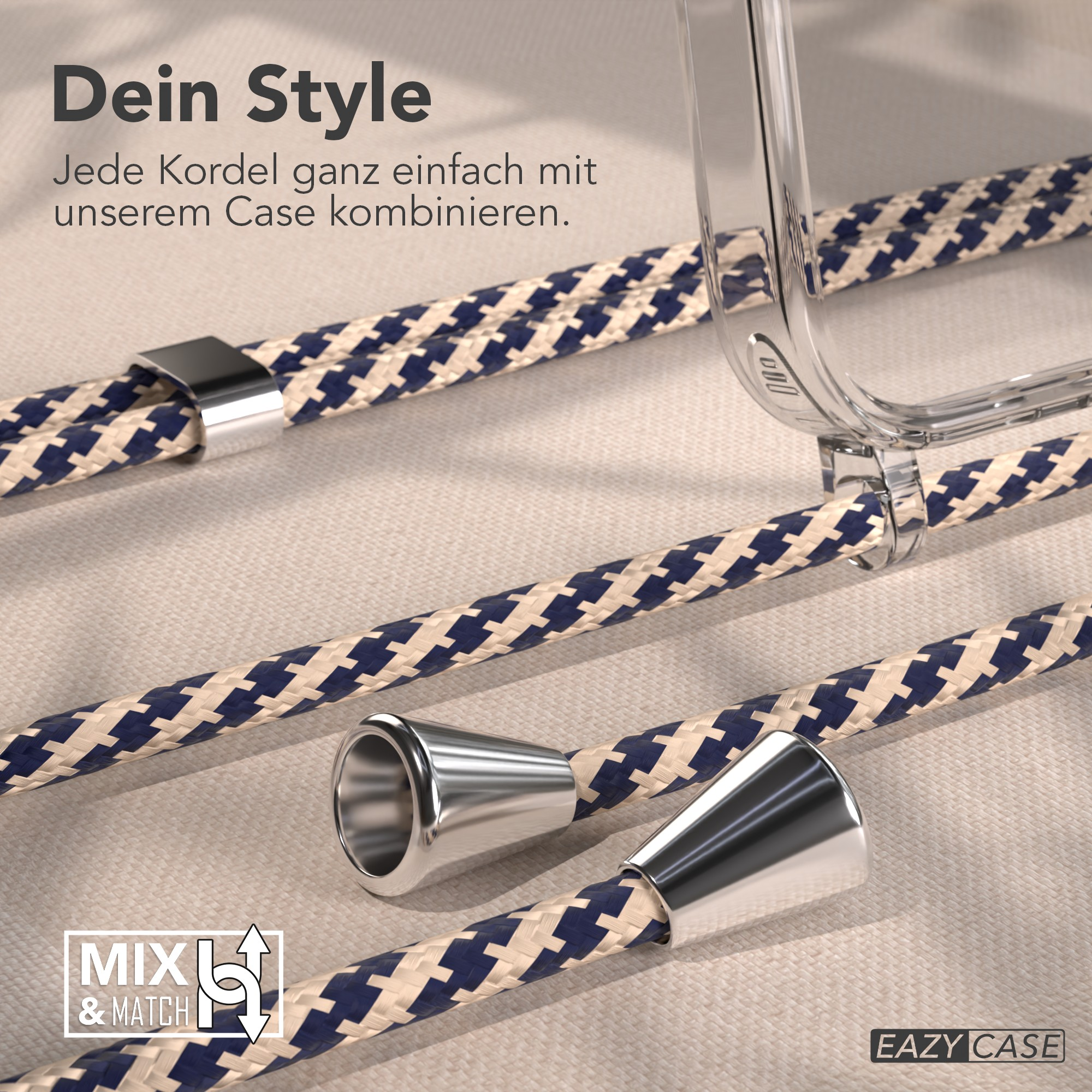 Nahaufnahme von seilartigen Schnüren mit blau-beigen Mustern. Silberne Metallverbinder und eine transparente Handyhülle sind sichtbar.