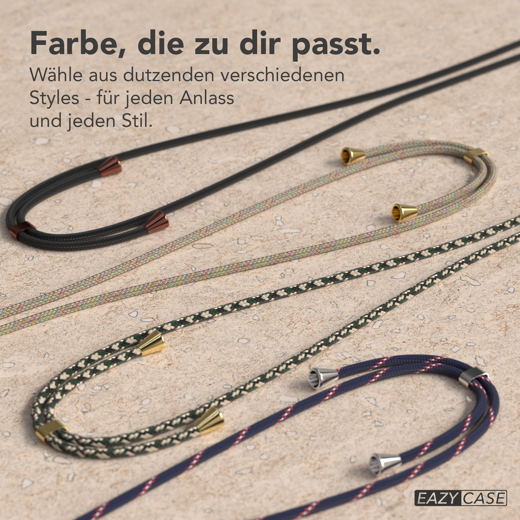 Das Bild zeigt mehrere Handy-Lanyards in verschiedenen Farben und Mustern auf strukturiertem Hintergrund. Der Text lautet: "Farbe, die zu dir passt."