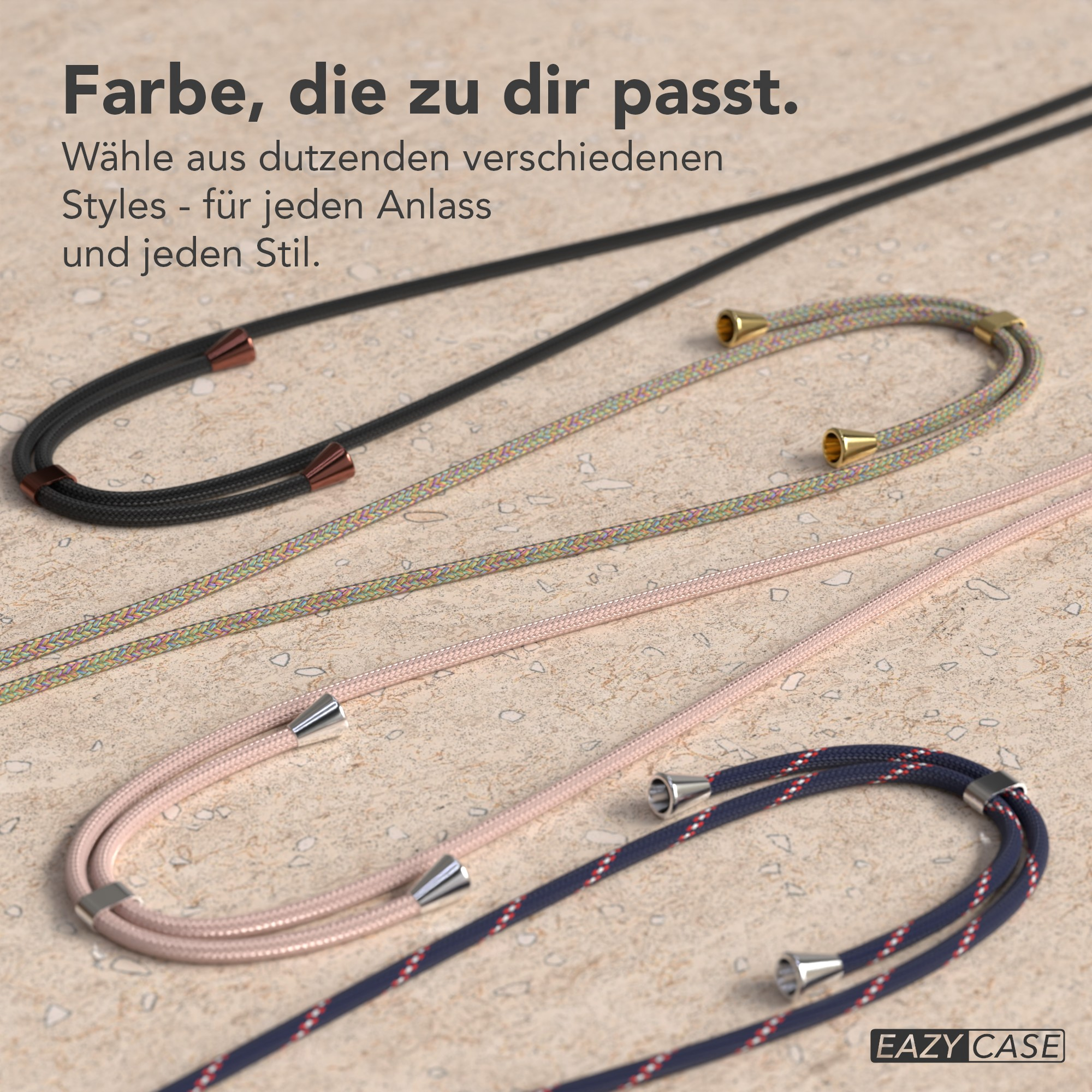 Das Bild zeigt vier Handy-Lanyards in verschiedenen Farben: Schwarz, mehrfarbig, Rosa und Marineblau. Der Hintergrund ist ein heller Stein.