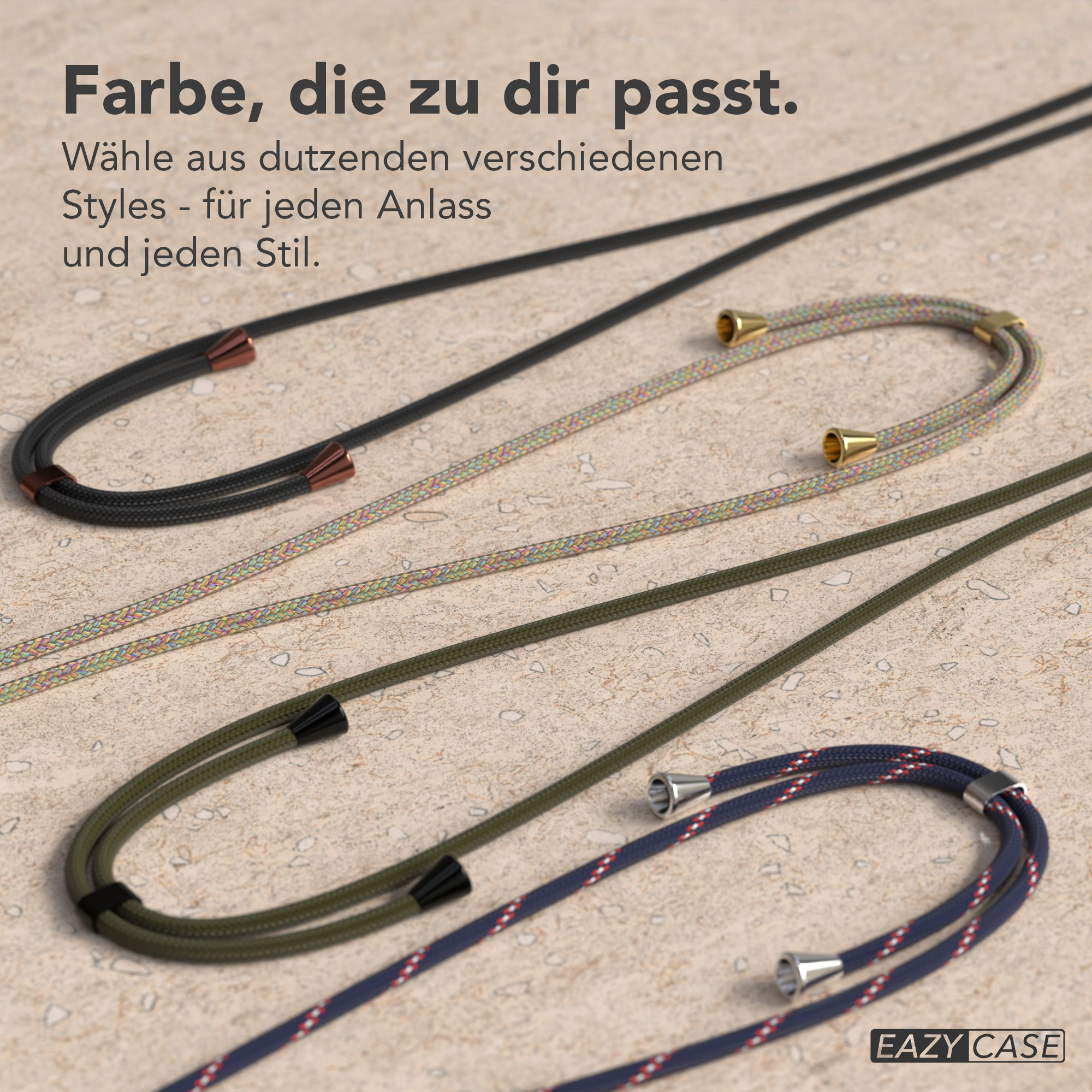 Das Bild zeigt Handystraps in Schwarz, Regenbogen, Grün und Blau mit weißen und roten Akzenten auf strukturierter Oberfläche.