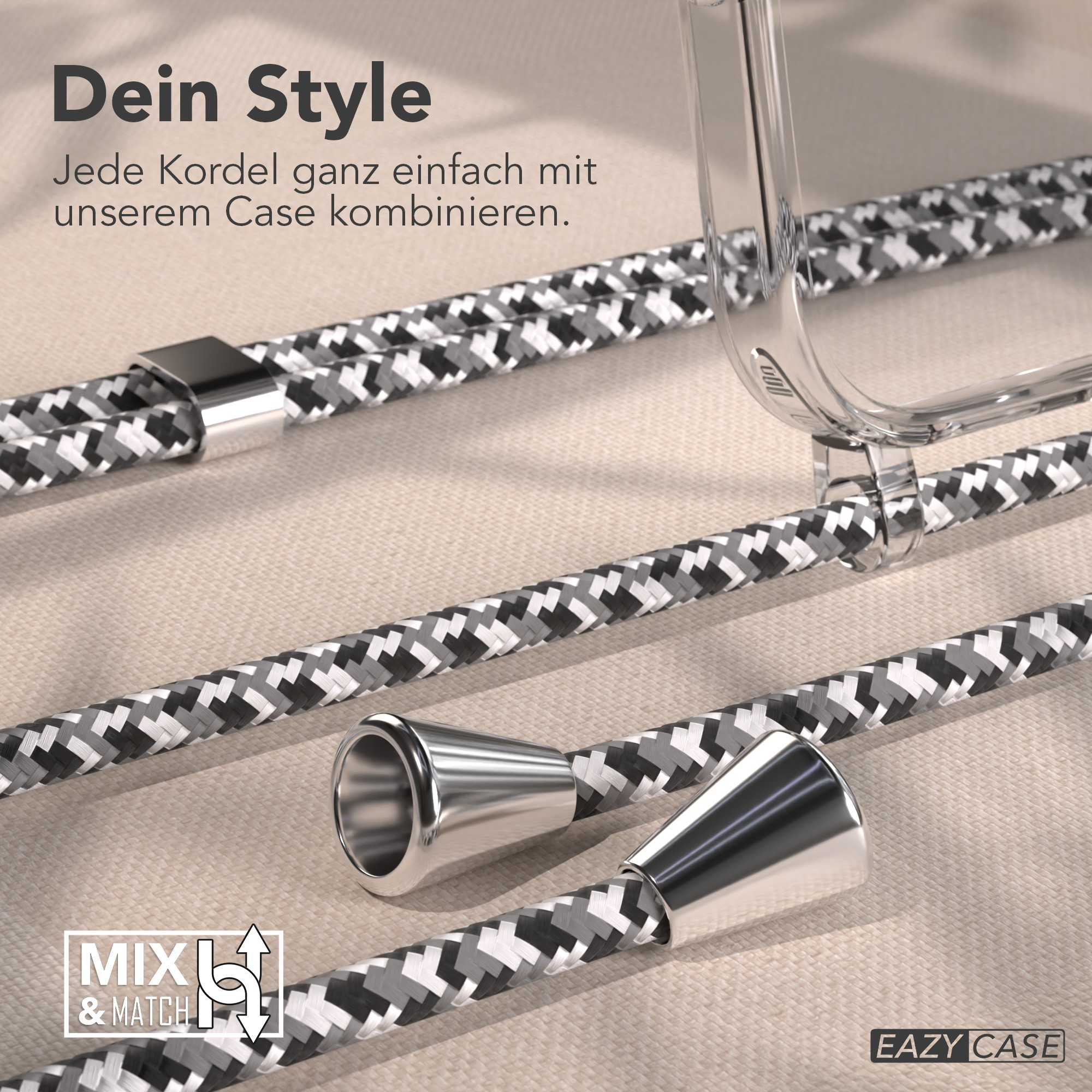 Das Bild zeigt Handykabel mit Metallenden. Die Kabel sind grau, schwarz und weiß. Eine transparente Handyhülle ist sichtbar. Text: "Mix & Match".