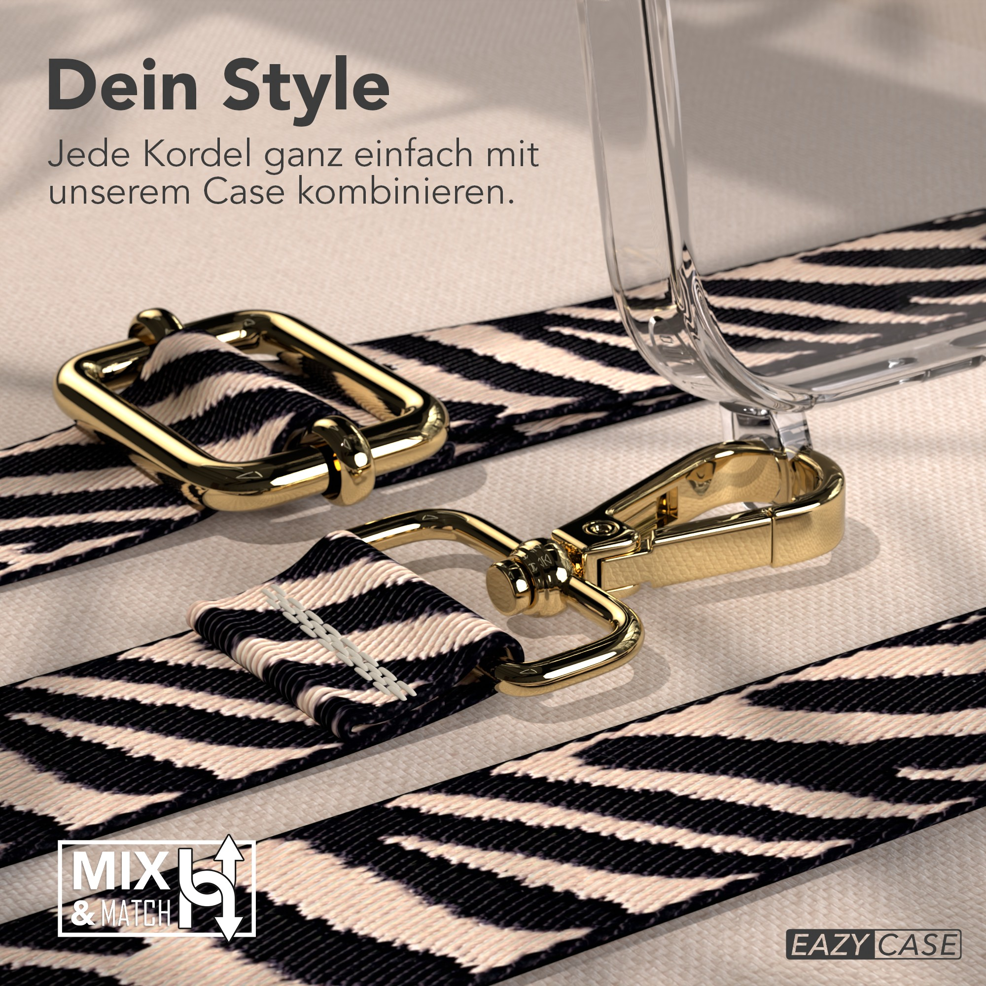 Nahaufnahme eines zebra-gestreiften Riemens mit goldfarbener Hardware, einer transparenten Handyhülle und Text.