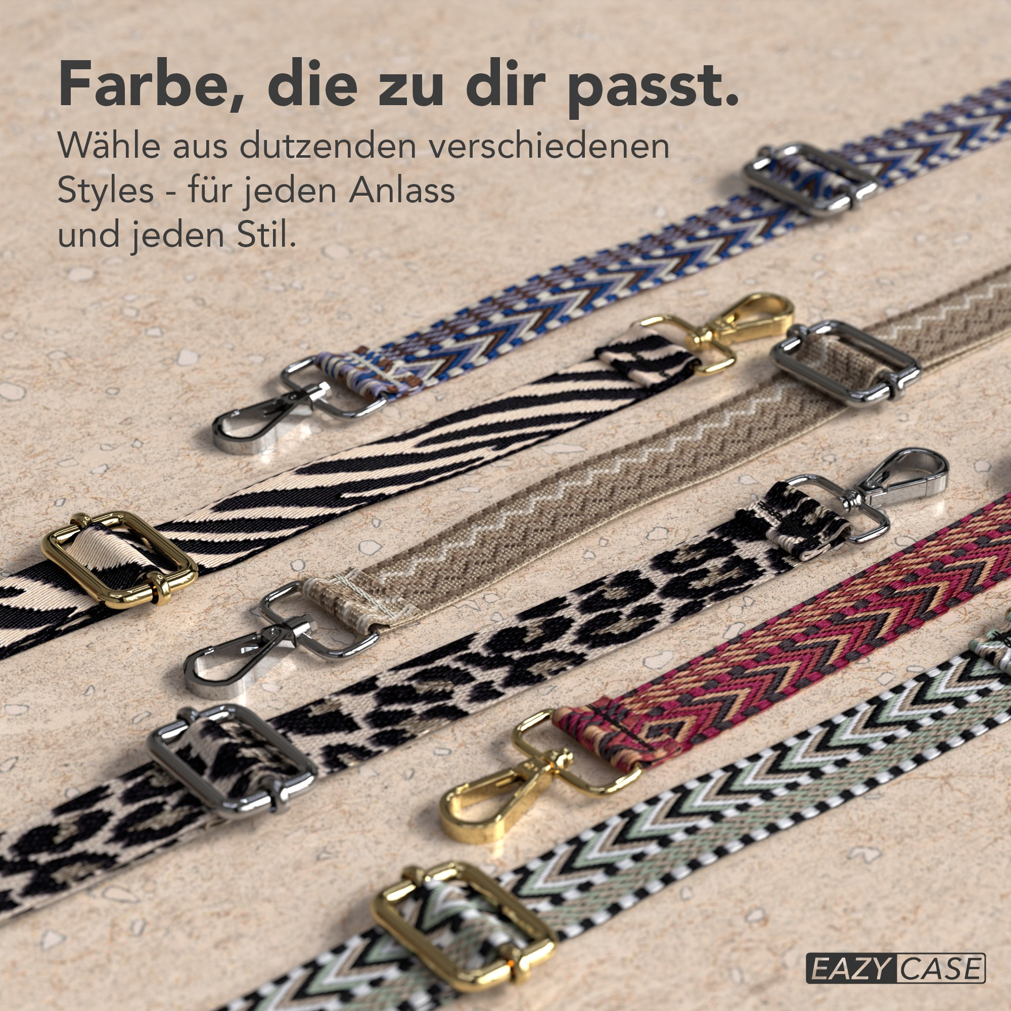 Das Bild zeigt mehrere farbenfrohe Taschenriemen mit verschiedenen Mustern und Metallverschlüssen auf einer strukturierten beigefarbenen Oberfläche.