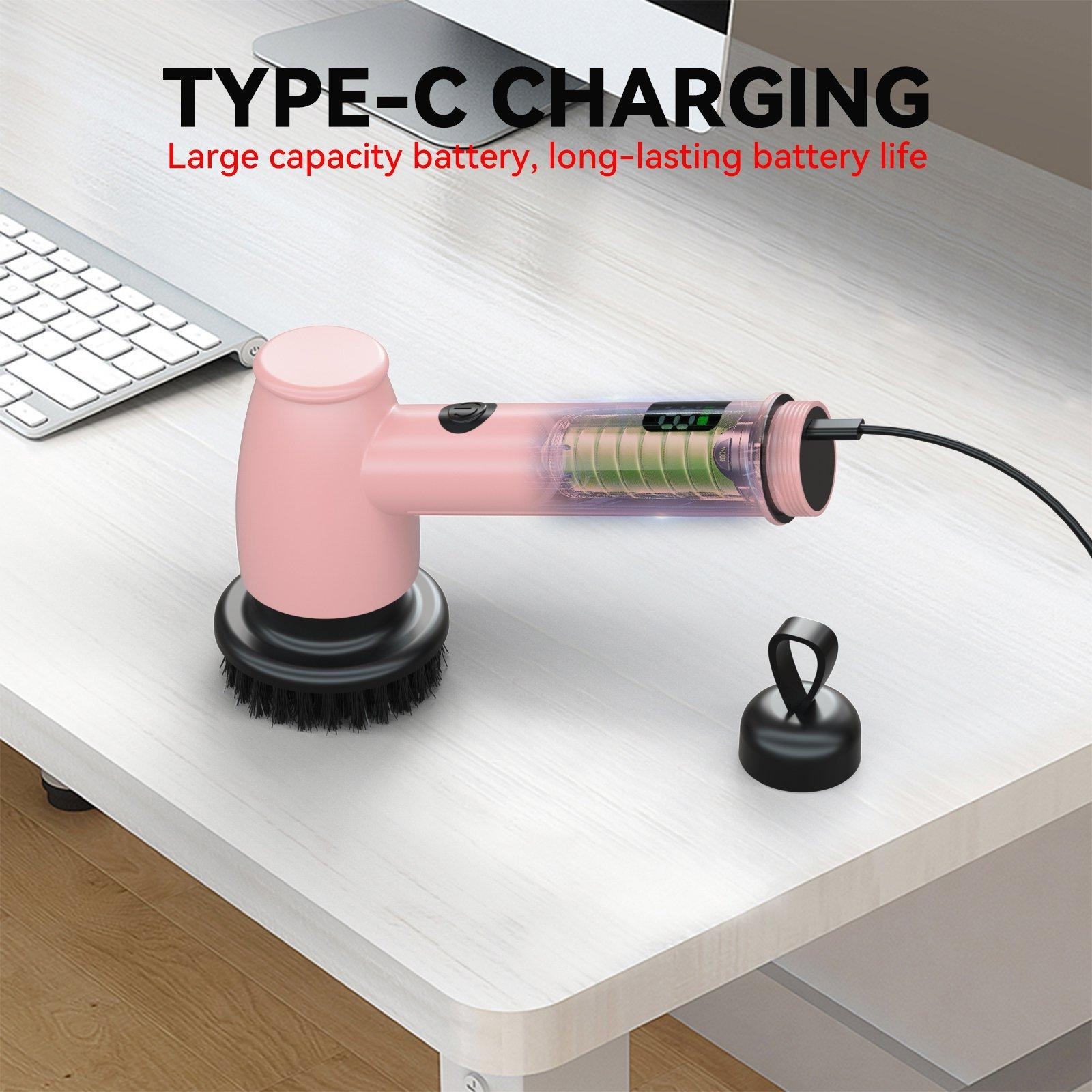 Pinke Reinigungsbürste, Ladekabel auf einem weißen Tisch. Text lautet "TYPE-C CHARGING".