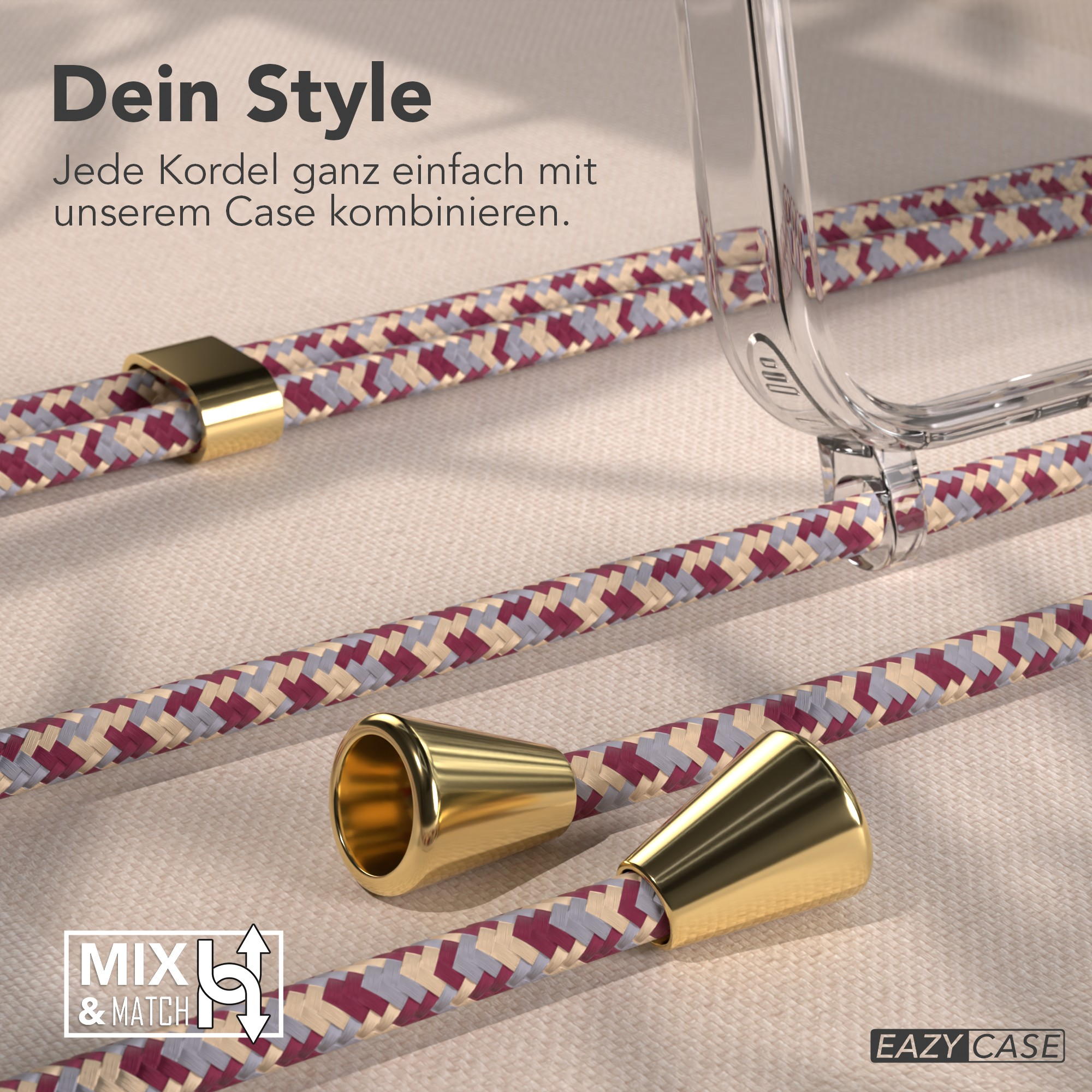 Das Bild zeigt Kordeln mit goldenen Akzenten und eine klare Handyhülle. Die Kordeln haben ein gewebtes Muster in Burgunderrot, Grau und Beige.