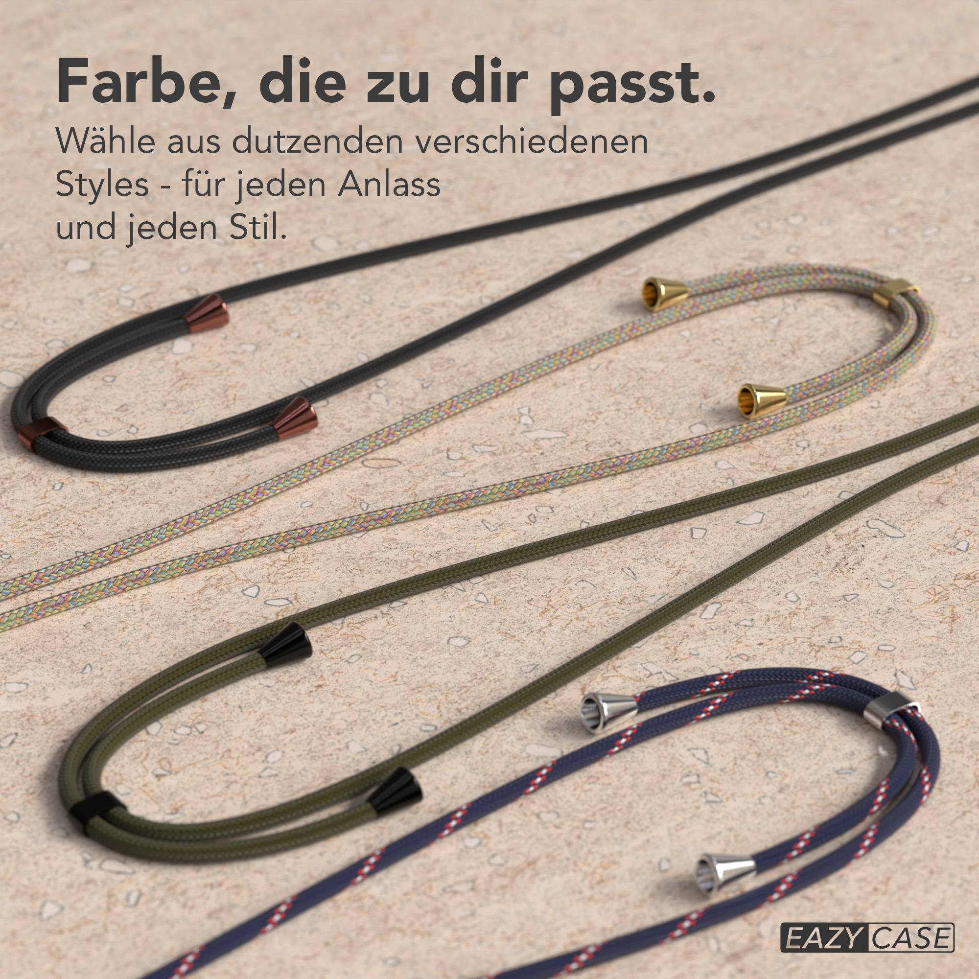 Nahaufnahme von Handystraps in verschiedenen Farben und Designs auf einer strukturierten Oberfläche. Die Straps sind für EAZY CASE.