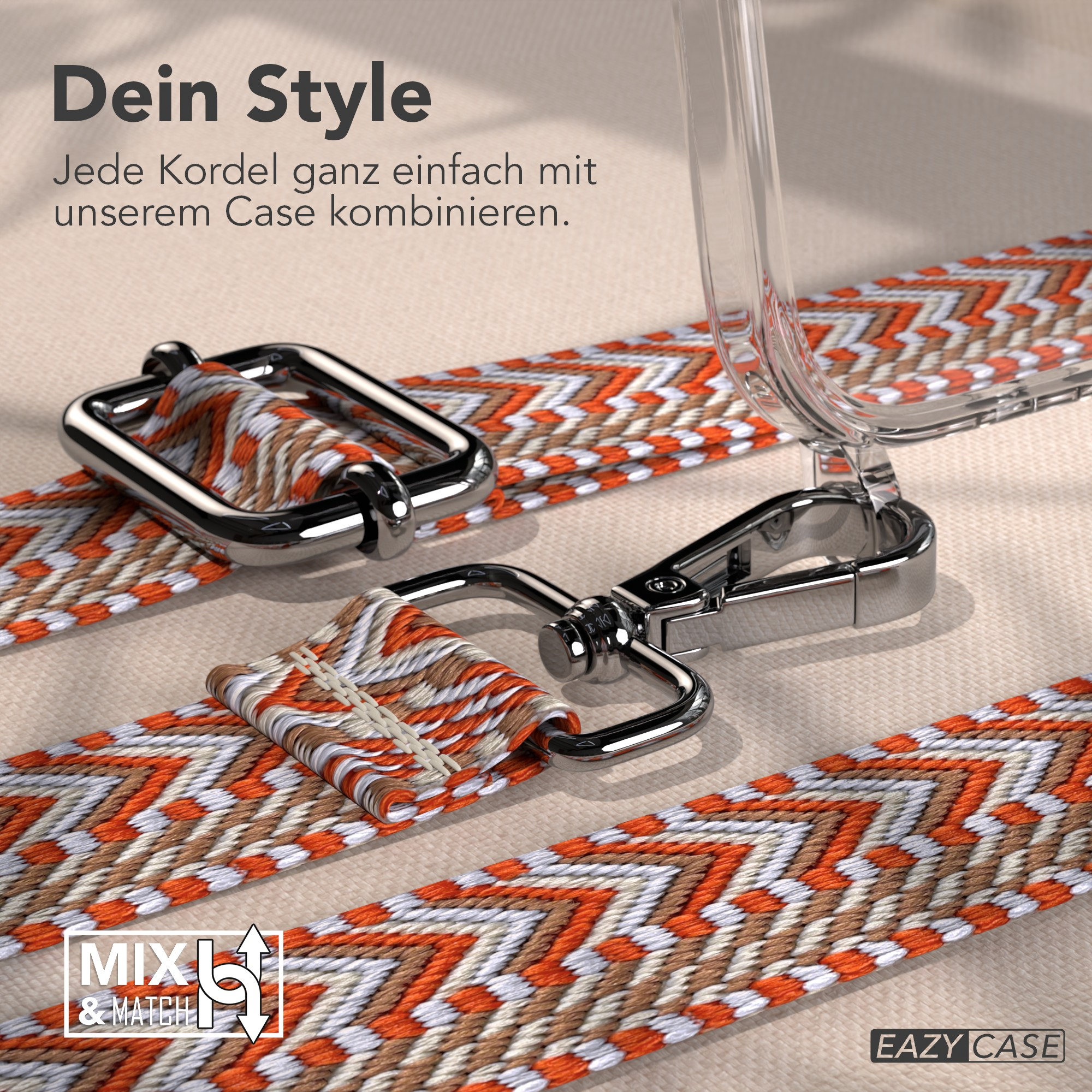 Das Bild zeigt einen Handyhüllenriemen mit orangefarbenen, weißen und braunen Mustern. Transparente Handyhülle sichtbar. Silberne Metallverschlüsse.