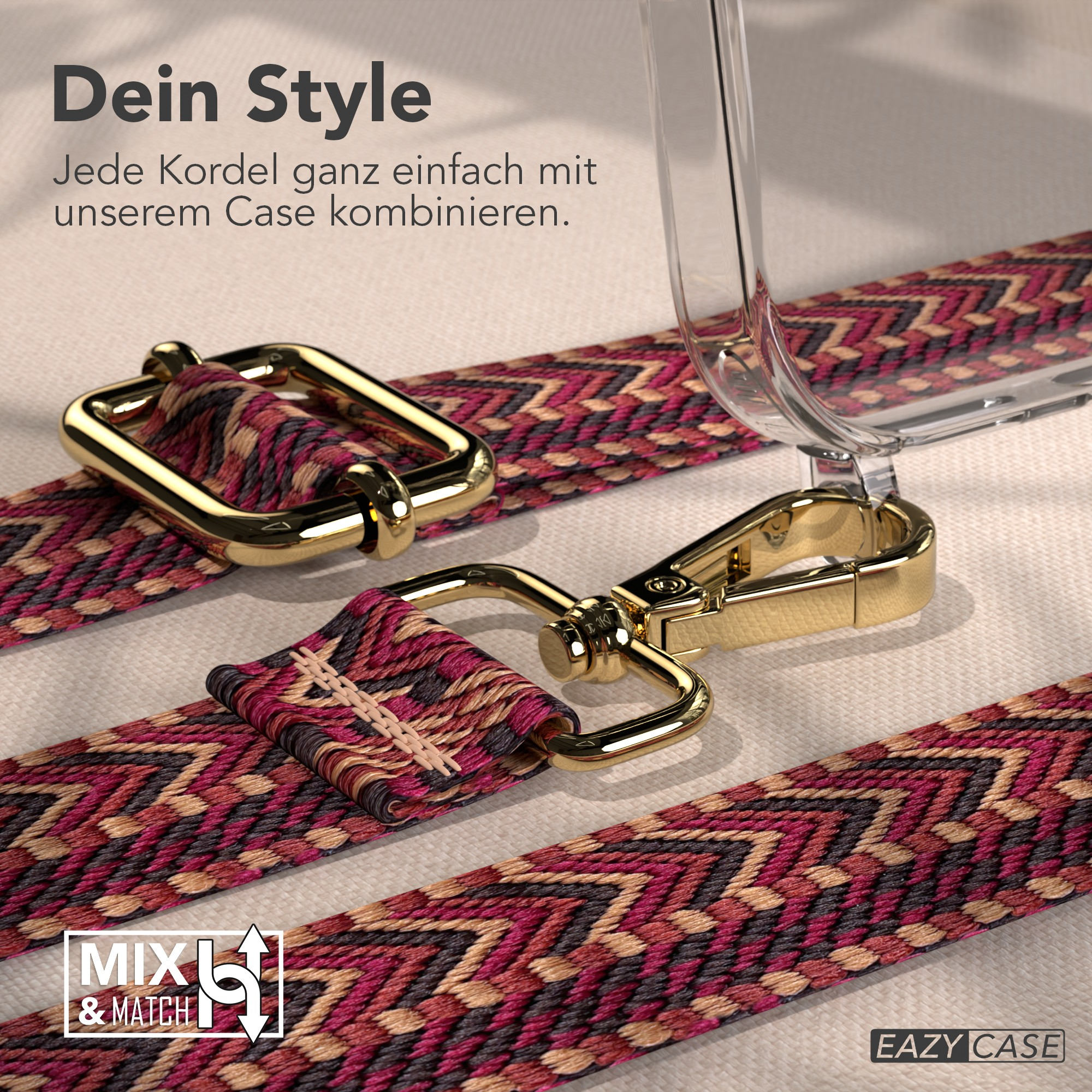 Nahaufnahme eines dekorativen Telefonriemens mit goldener Hardware. Der Riemen hat ein rotes, braunes und beiges Zickzackmuster.