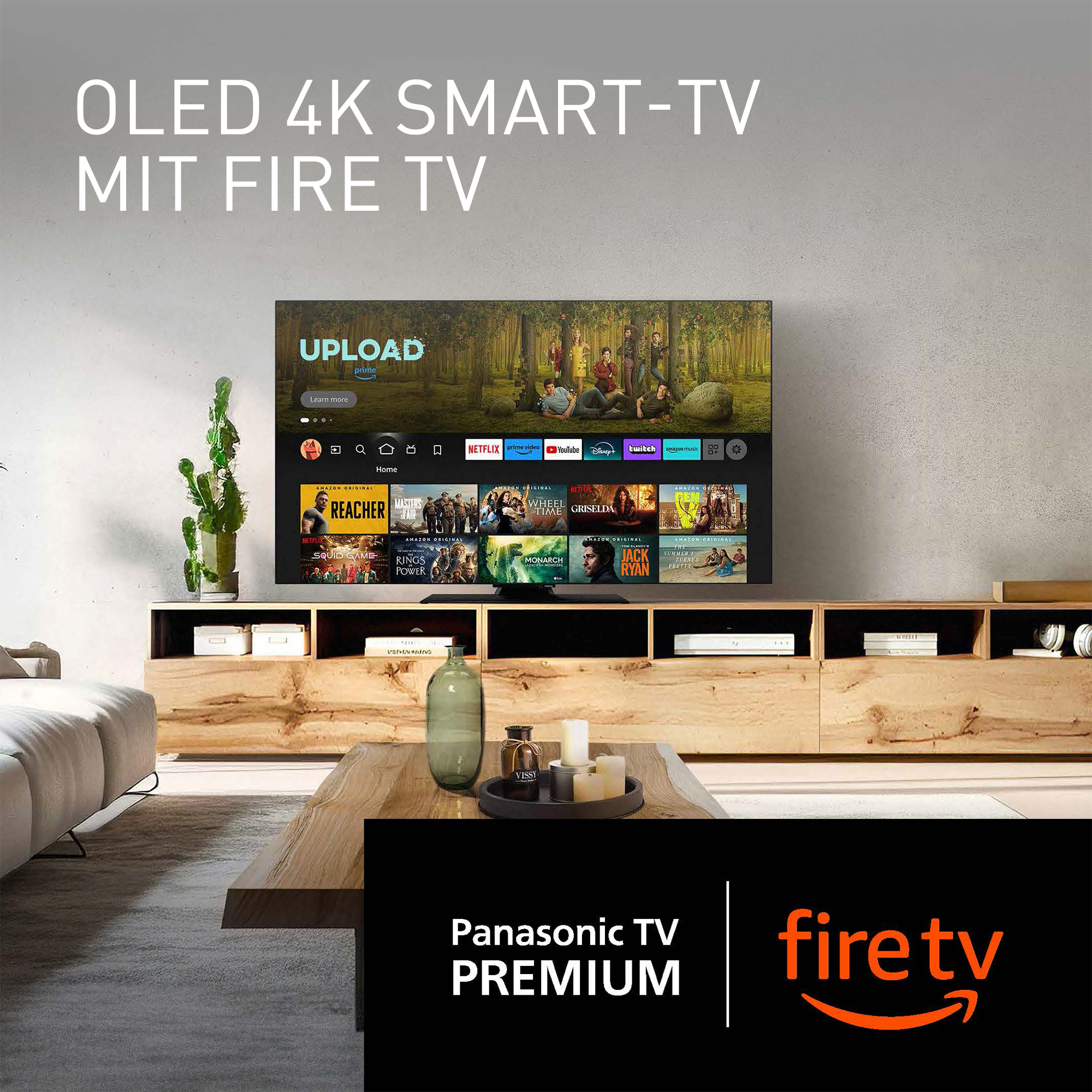 Salon z telewizorem z treściami strumieniowymi, drewnianym stołem i kaktusem.