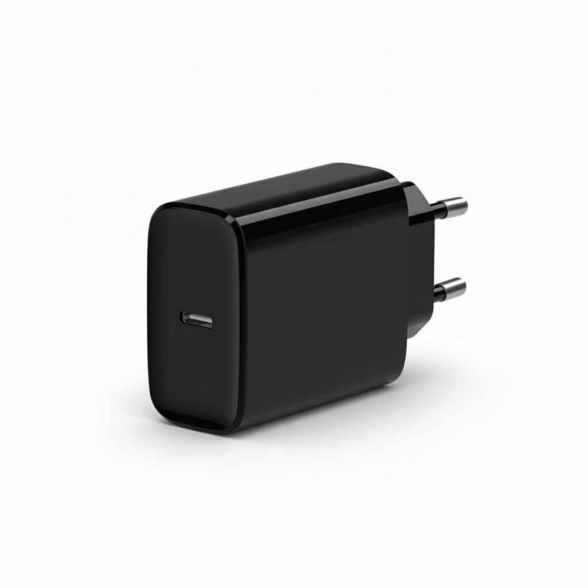 Ein schwarzes Telefonladegerät mit USB-C-Anschluss und zwei Metallstiften auf weißem Hintergrund.