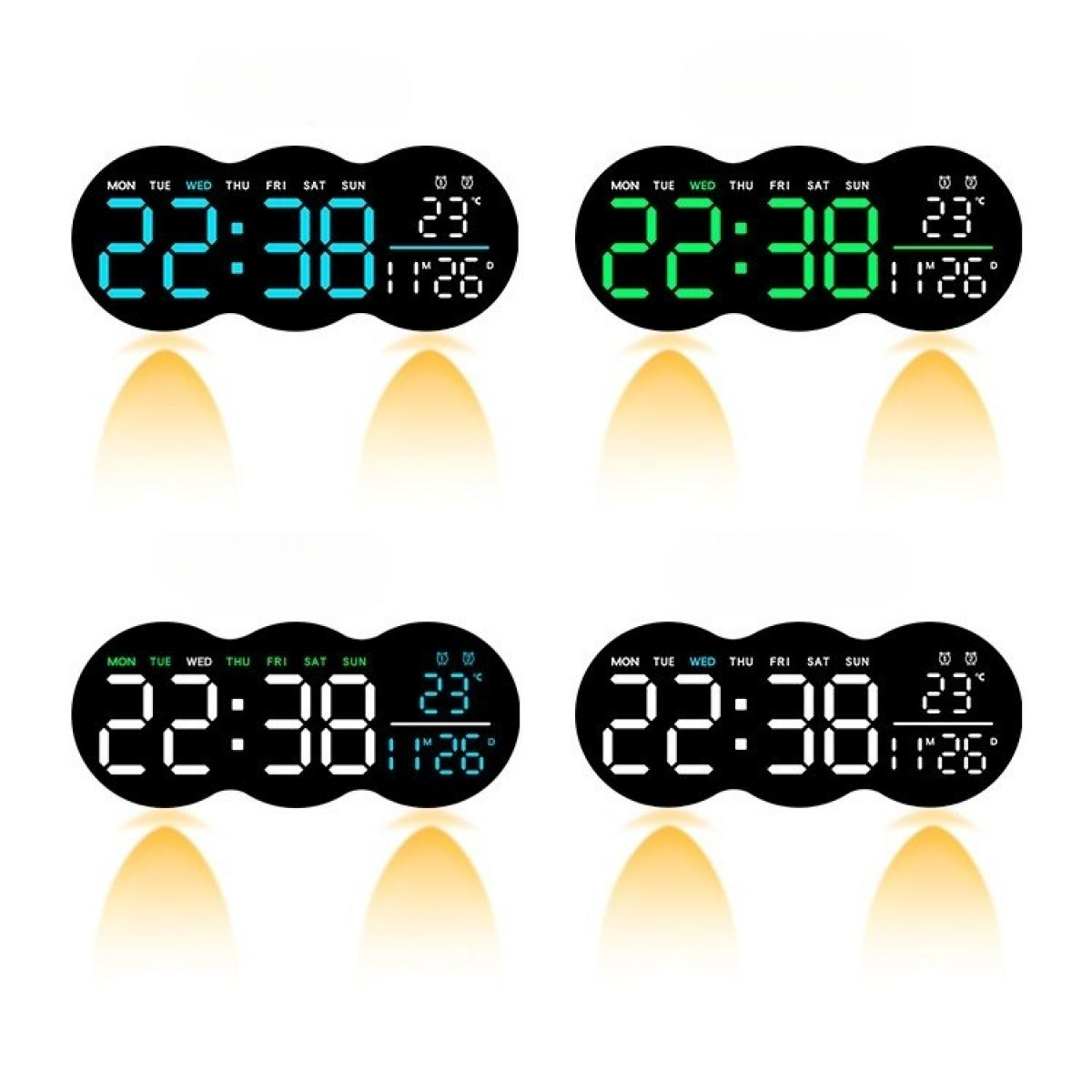Vier Digitaluhren, die 22:38 Uhr, eine Temperatur von 23 Grad und das Datum anzeigen. Jede Uhr hat eine andere Farbanzeige.