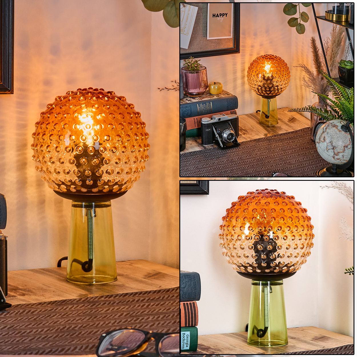 Eine dekorative Lampe mit strukturiertem, orangefarbenem Glasschirm auf grünem Sockel. Auf dem Schreibtisch liegen Bücher und eine Kamera.
