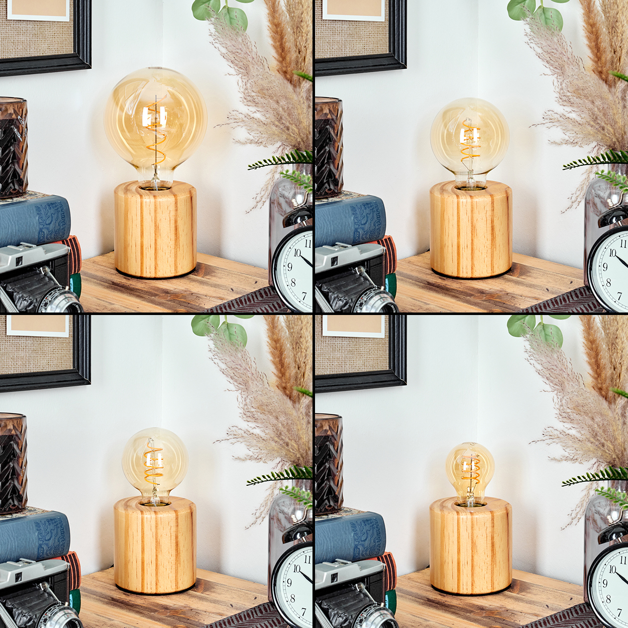 Eine Holzlampe mit einer großen Glühbirne steht auf einem Holzregal. Weitere Gegenstände sind eine Kamera, Bücher und eine Uhr.