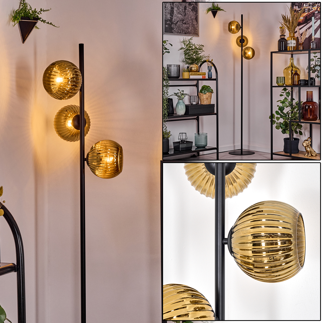 Eine moderne Stehlampe mit drei bernsteinfarbenen Glaskugeln. Schwarzer Mast und Sockel. Hintergrund mit Regalen.