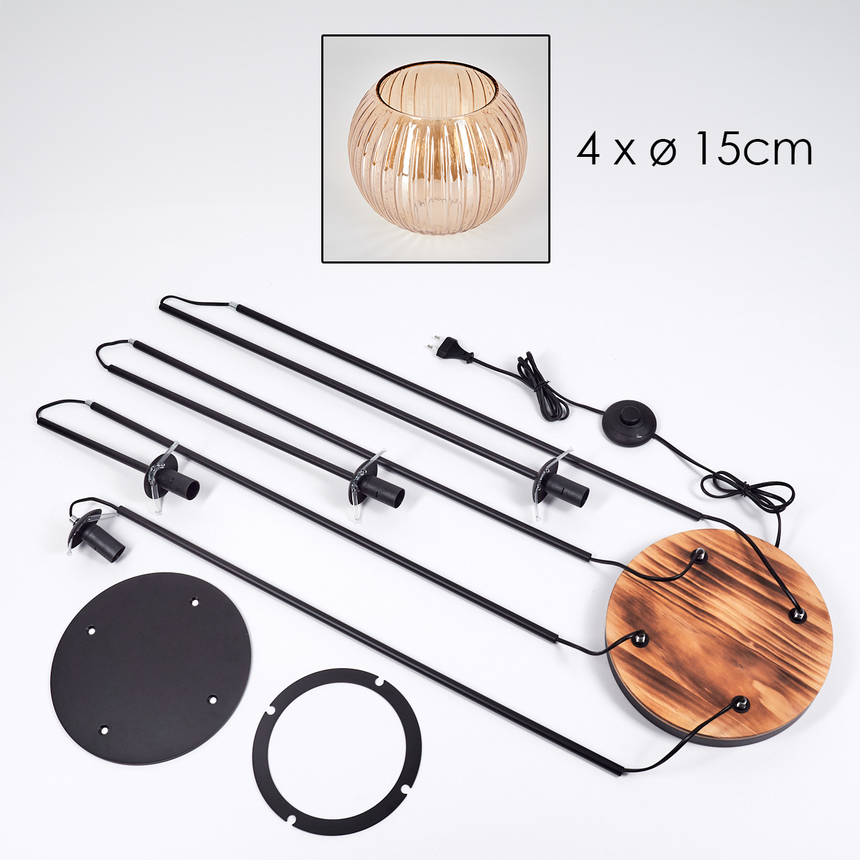 Zerlegte Lampenteile. Enthält einen Glasschirm, schwarze Metallstangen, einen Holzsockel und verschiedene elektrische Komponenten.