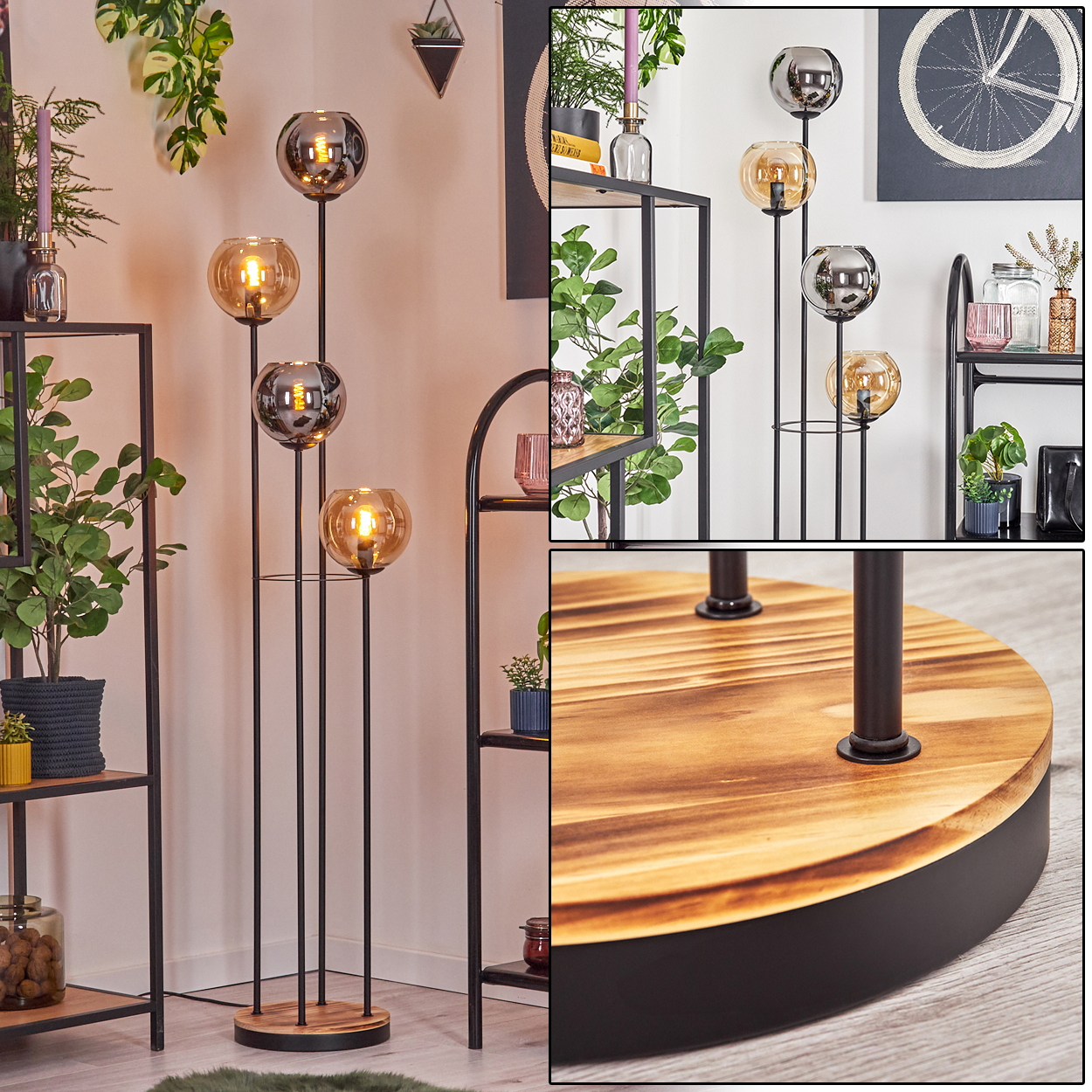 Eine Stehlampe mit vier Glaskugelschirmen, schwarzem Metallrahmen und Holzsockel, umgeben von Pflanzen und Regalen.