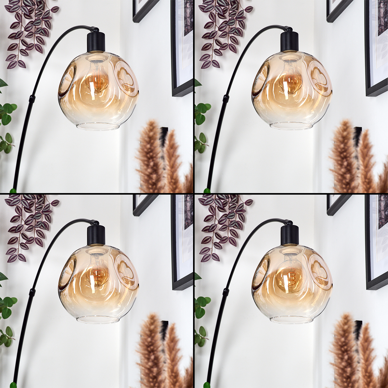Eine dekorative Lampe mit Glasschirm. Sie hängt an einem schwarzen Ständer. Im Hintergrund befinden sich dekorative Pflanzen und Bilder.