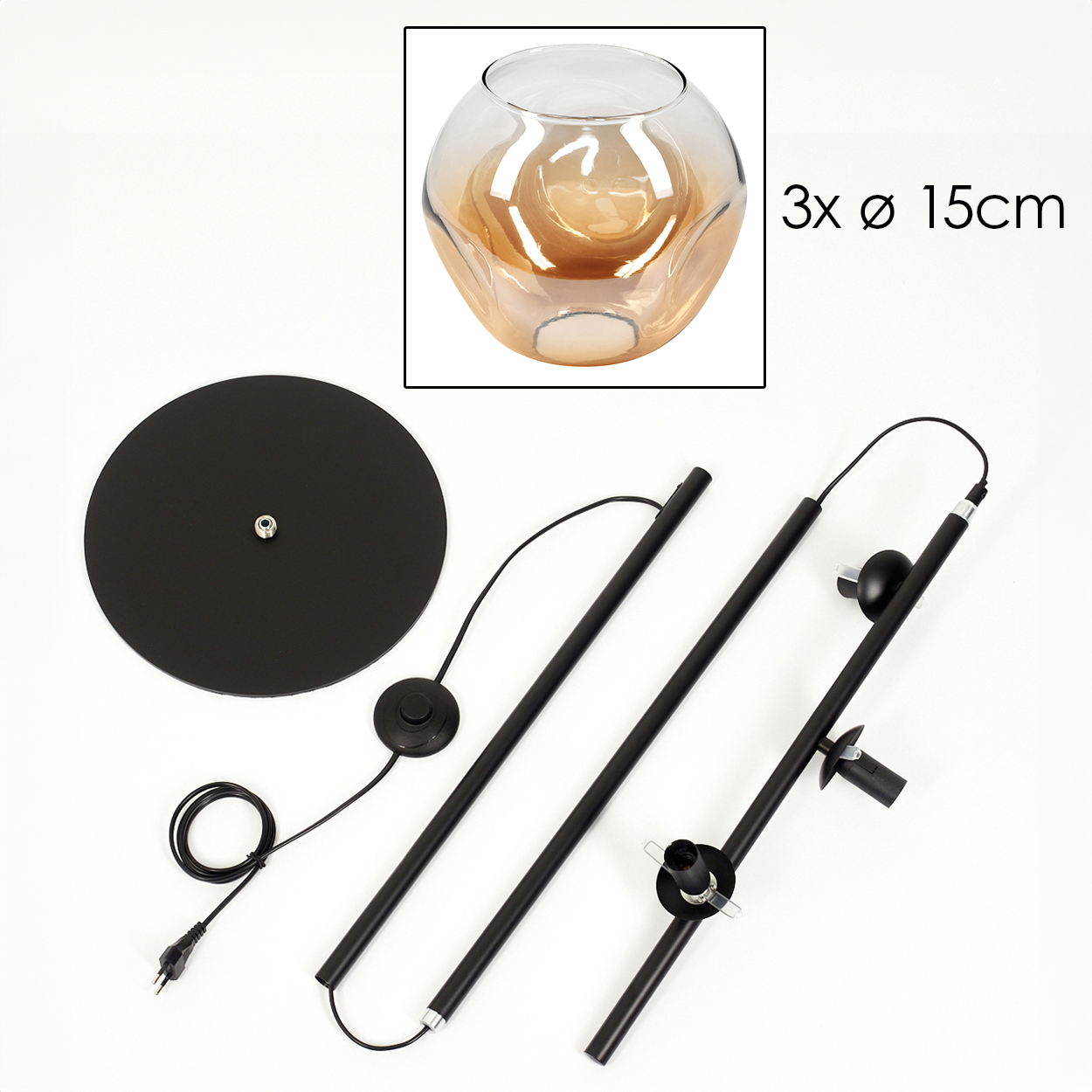 Eine zerlegte Lampe mit schwarzem Sockel, Stangen und einem Glasschirm. Die Teile liegen auf weißem Untergrund.