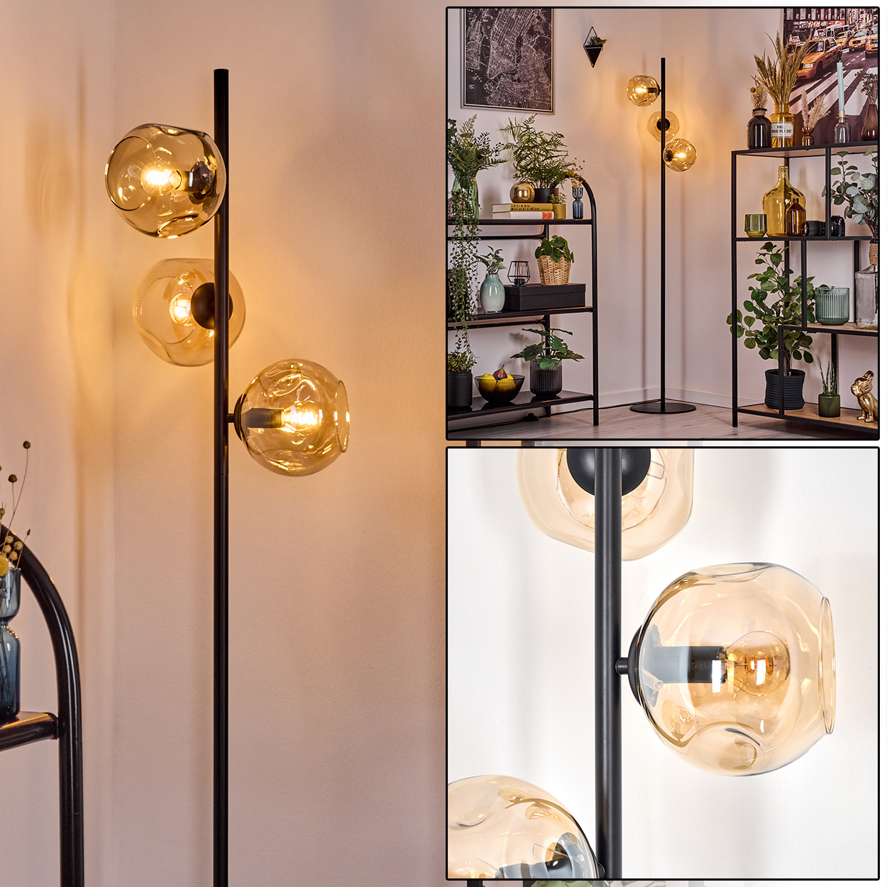 Eine moderne Stehlampe mit drei bernsteinfarbenen Glaskugeln. Sie steht vor einer weißen Wand in der Nähe eines schwarzen Metallregals mit Pflanzen und Dekoration.