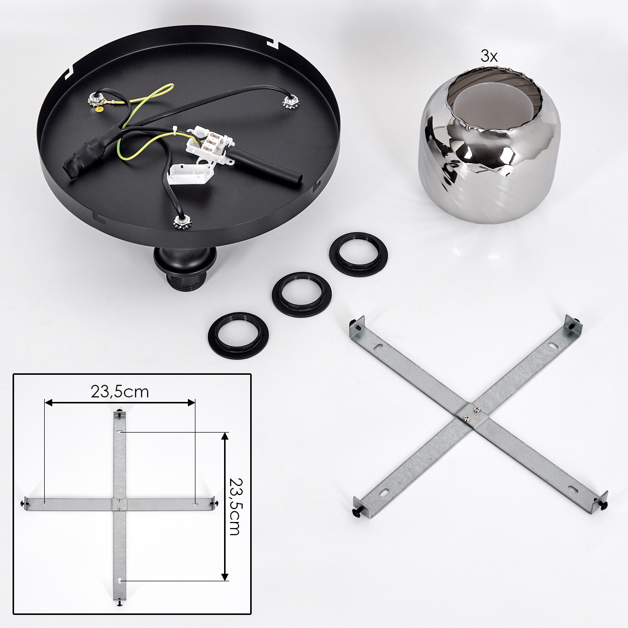 Deckenleuchtenkomponenten: schwarze Basis mit Drähten, silberne Leuchte, schwarze Ringe, kreuzförmige Metallhalterung, Maßdiagramm.