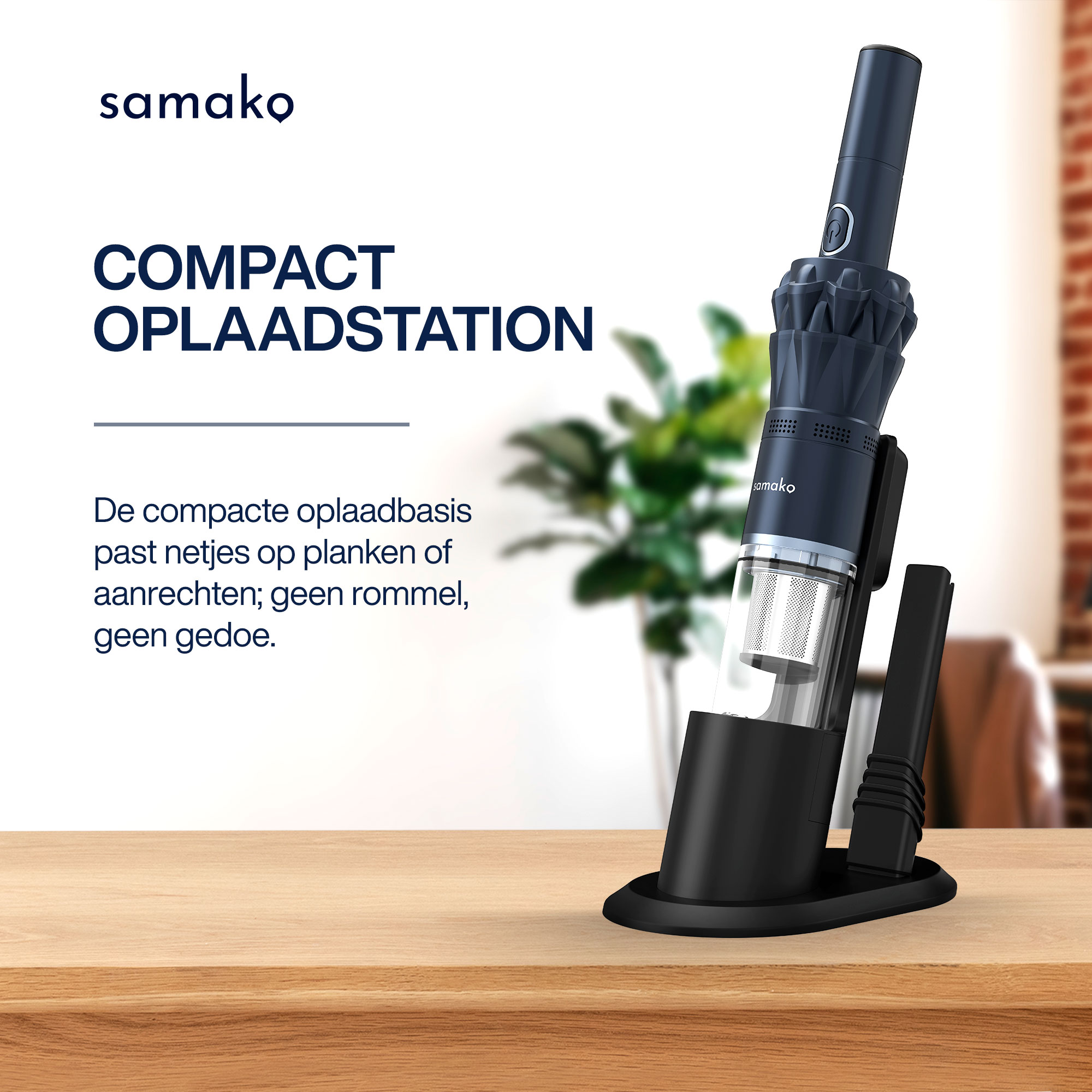 A black vacuum cleaner sits on a wooden table. The text COMPACT OPLAADSTATION is visible. A green plant is in the background.