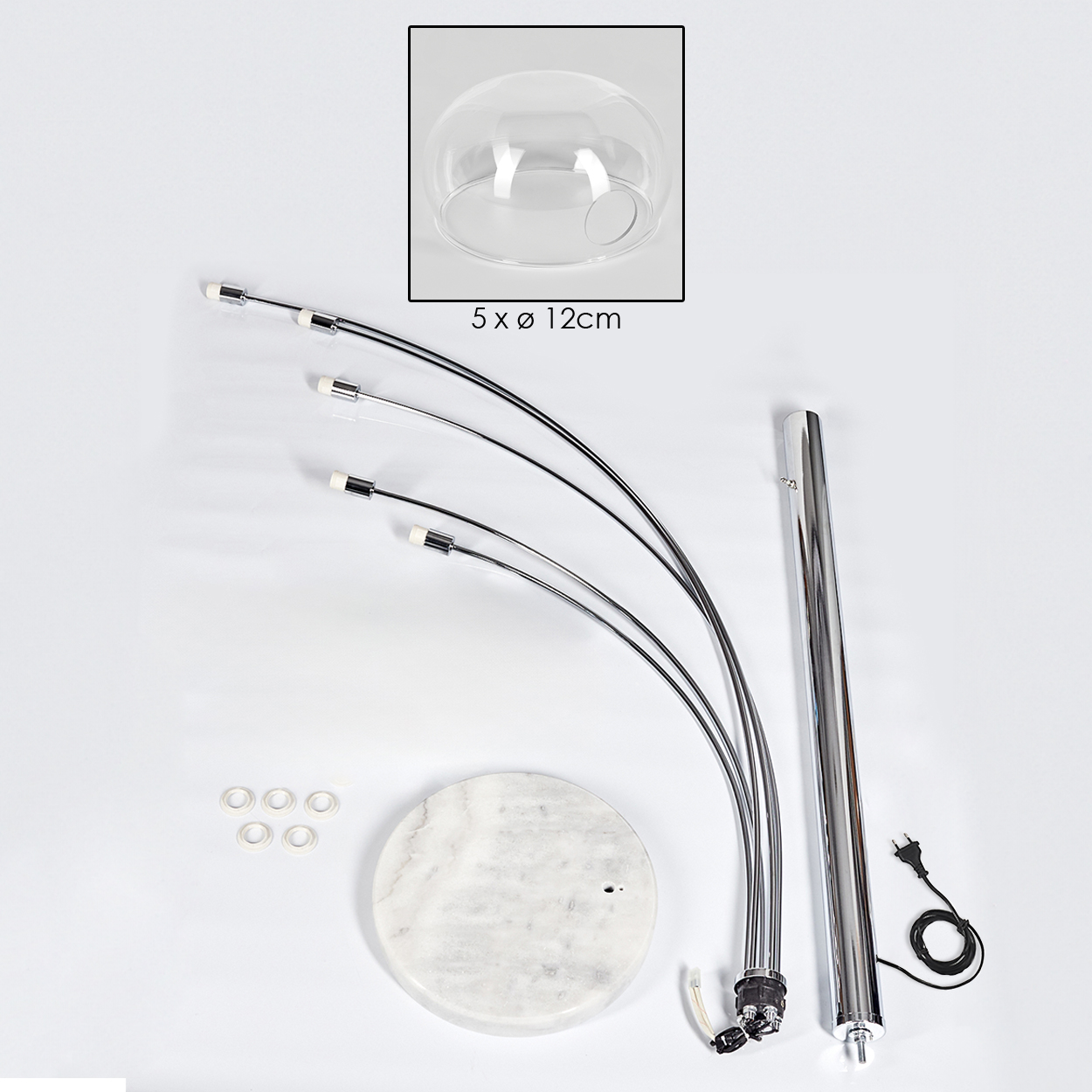 Zerlegte Bogenlampe mit Glaskuppel, runder Marmorbasis und Metallkomponenten auf weißer Oberfläche.