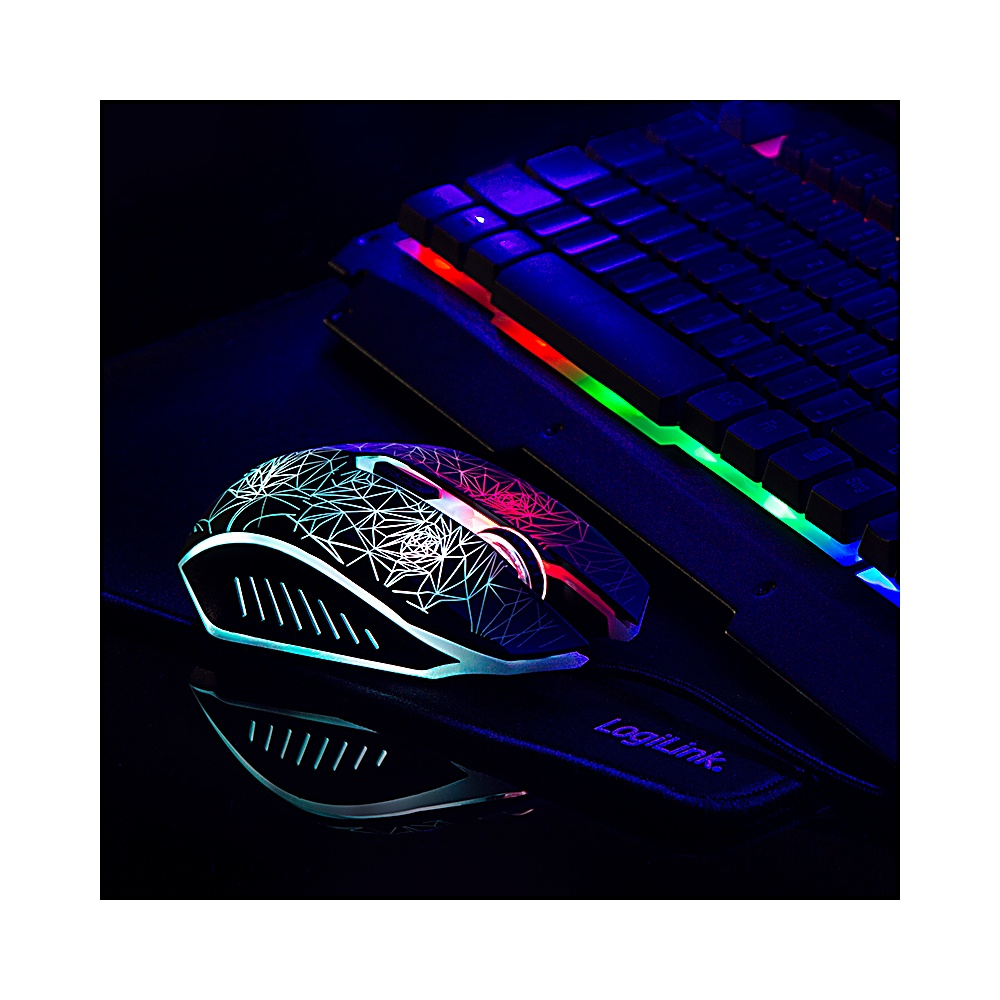 Un mouse da gioco con motivi geometrici e una tastiera con luci colorate sono su una superficie nera. Il mouse si riflette.